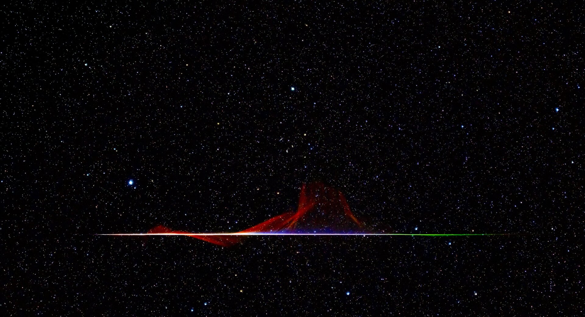 A meteor’s streak across the sky.