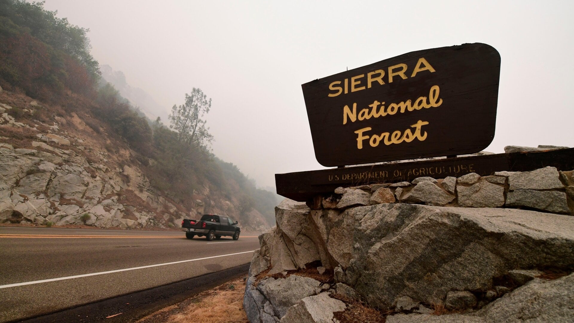 A vehicle entering the Sierra National Forest northeast of Fresno in the foothills of the Sierra Nevada mountains on Sept. 11, 2020, during a forest fire in the area.