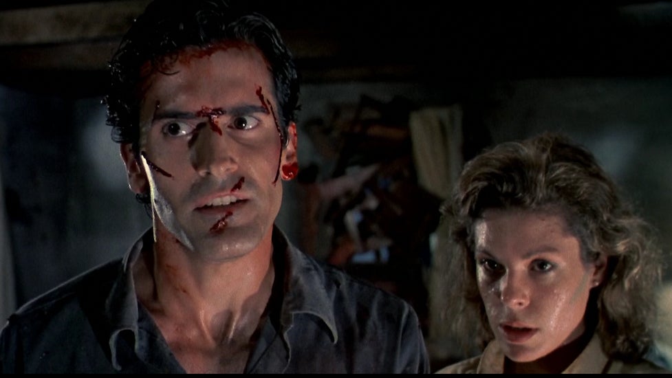 Bruce Campbell and Ellen Sandweiss in The Evil Dead.