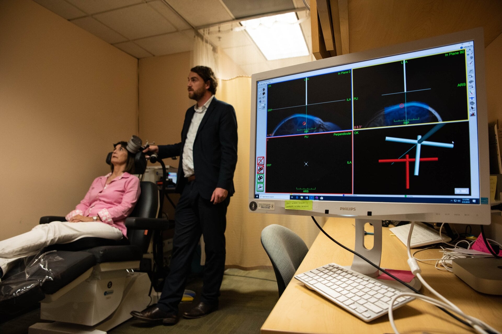 Nolan Williams demonstrating their SNT treatment on an unnamed patient. 