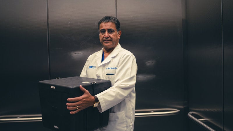 Surgeon Shaf Keshavjee with his very precious cargo. 