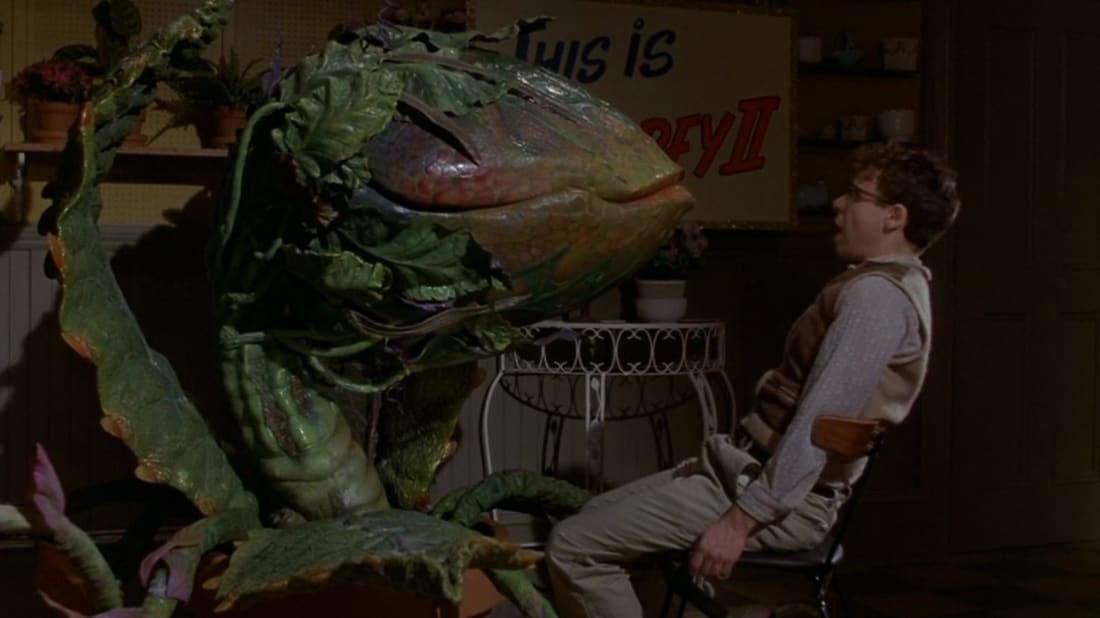 Rick Moranis is in trouble in Little Shop of Horrors.