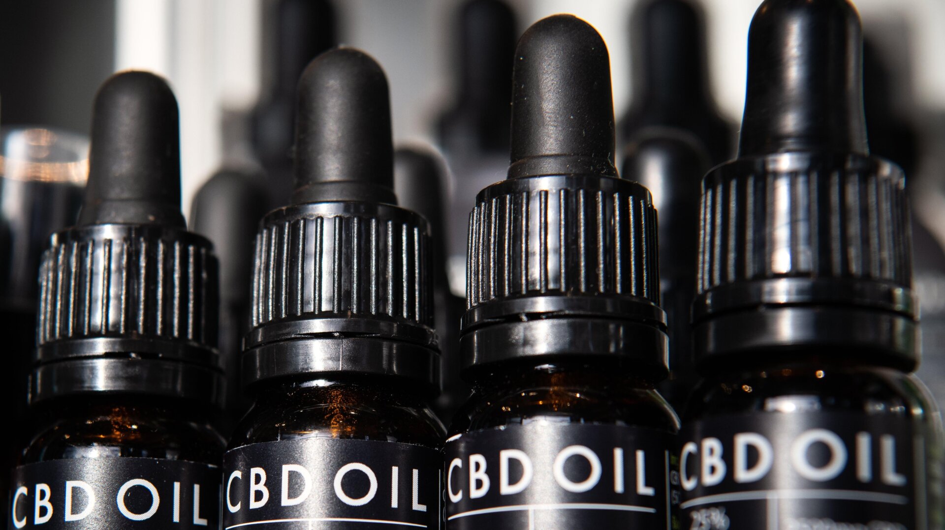 A row of bottles of CBD oil are seen in a branch of the health chain Planet Organic on February 17, 2020 in London, England.