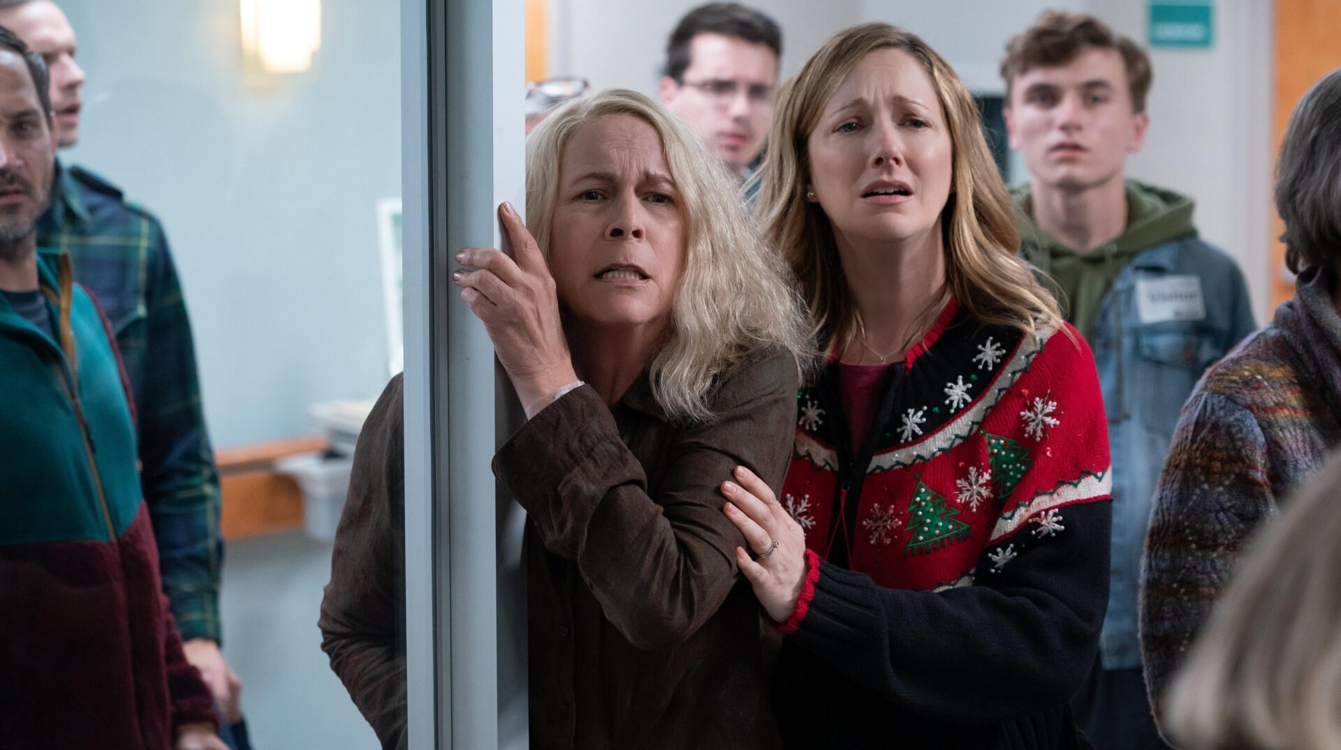 Laurie (Jamie Lee Curtis) with Karen (Judy Greer), who is indeed still wearing that Christmas sweater.