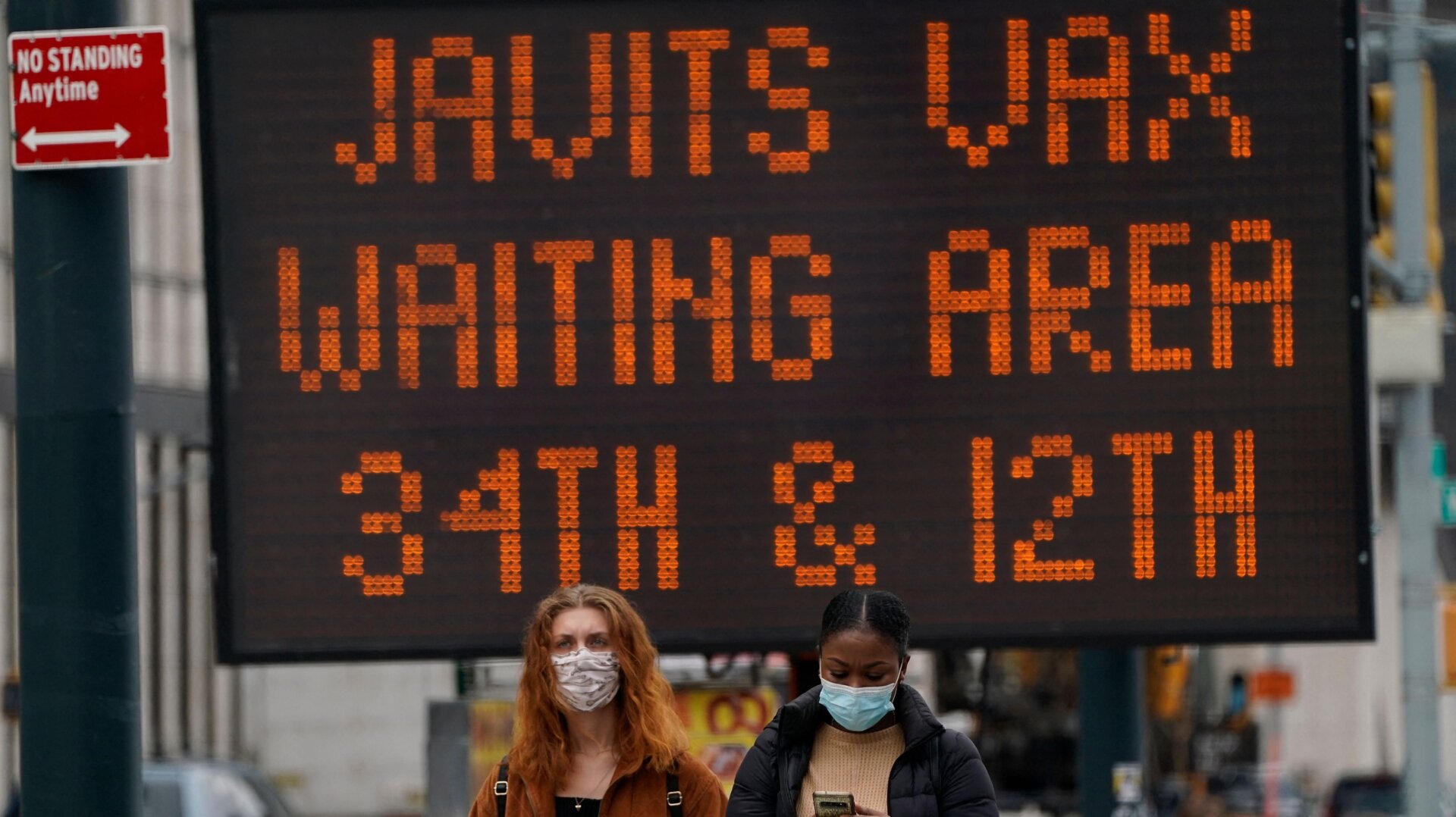 New Yorkers arrive at the Javits Center Covid-19 vaccination center on April 13, 2021 in New York City.