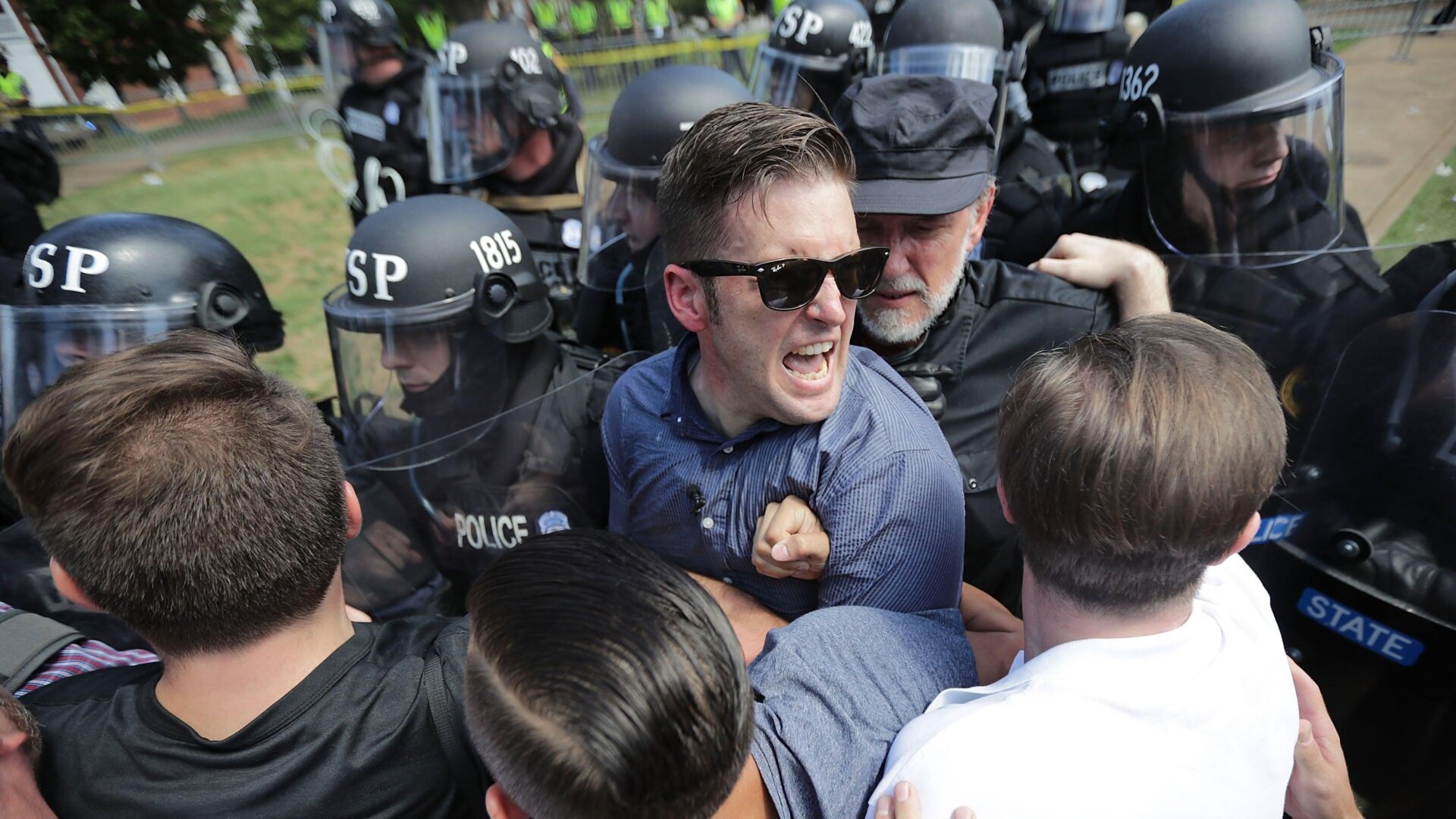 White supremacist Richard Sspencer, seen here as he and his supporters fight with Virginia State Police in Charlottesville, Virginia’s Emancipaton Park after Unite the Right was declared an unlawful gathering on Aug. 12, 2017.
