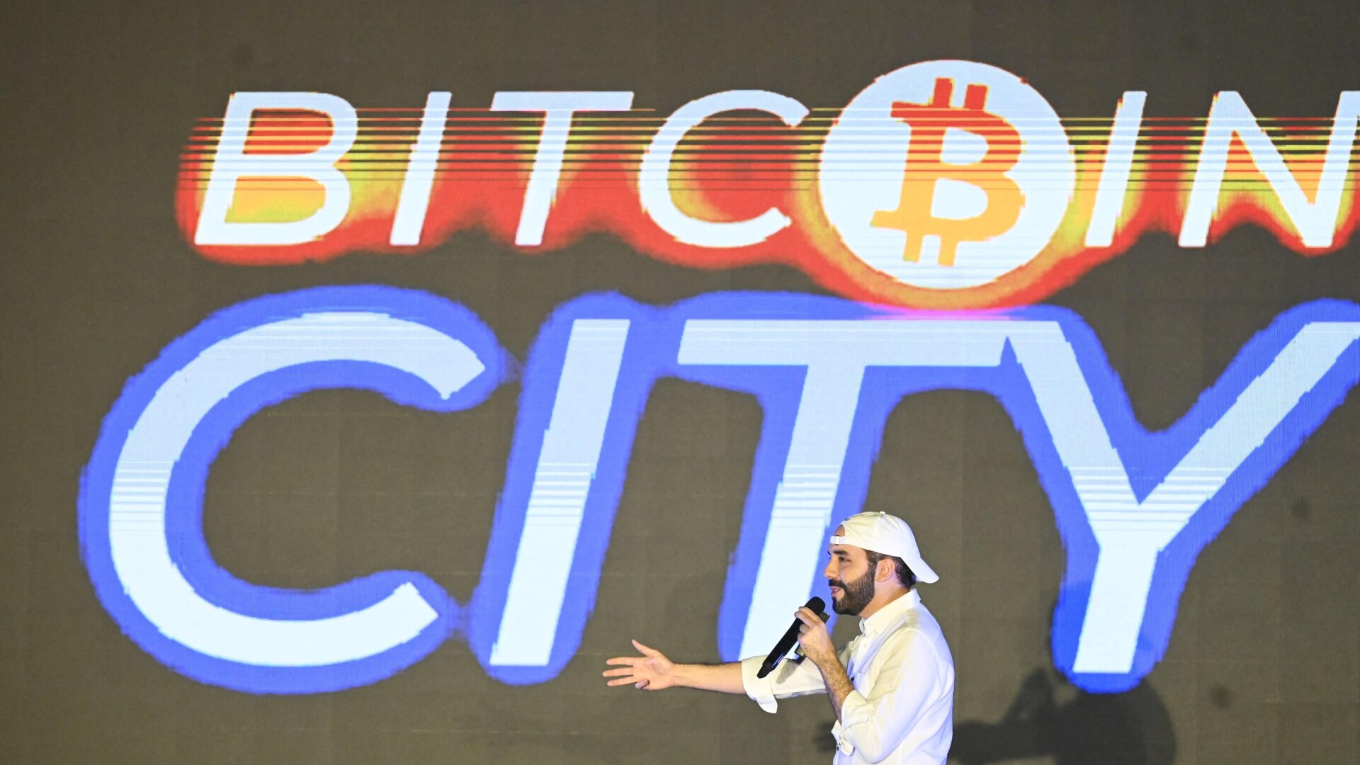 The president of El Salvador, Nayib Bukele, gestures during his speech at the closing ceremony of the Latin Bitcoin Conference at Mizata Beach on November 20, 2021.