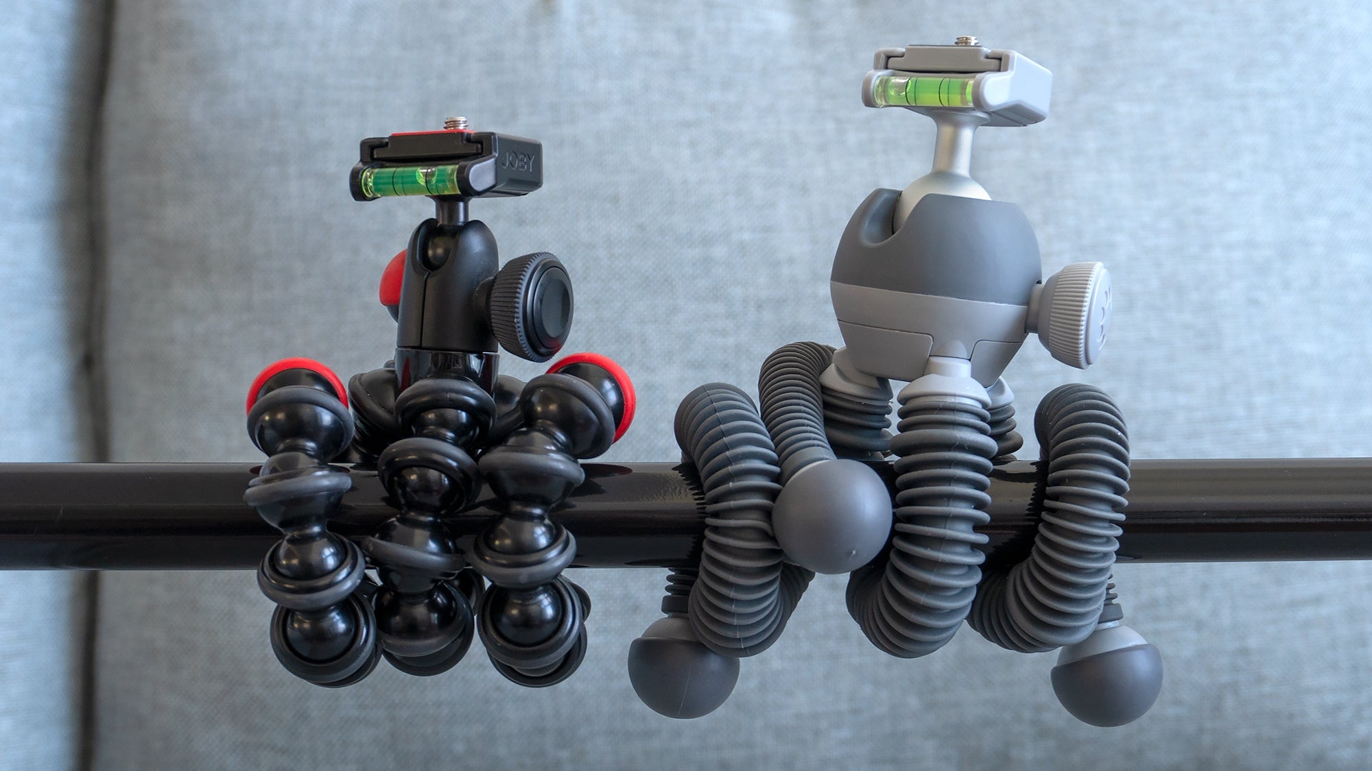 The flexible legs on the new PodZilla tripod (right) can be bent to a tighter radius than the GorillaPod (left) can be.
