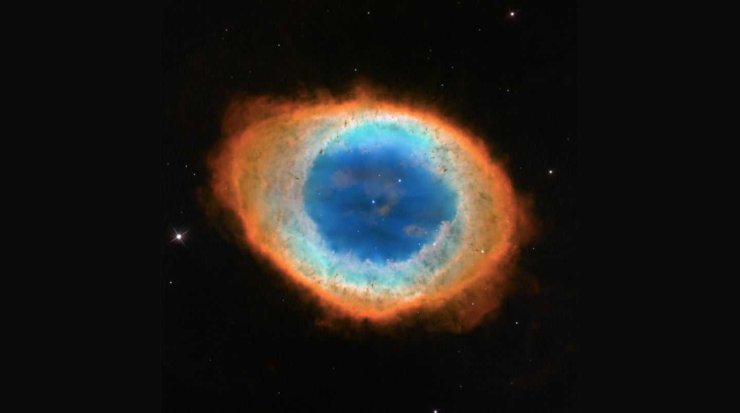 The Ring Nebula, Messier 57, with a white dwarf at its core, imaged by the Hubble Space Telescope.