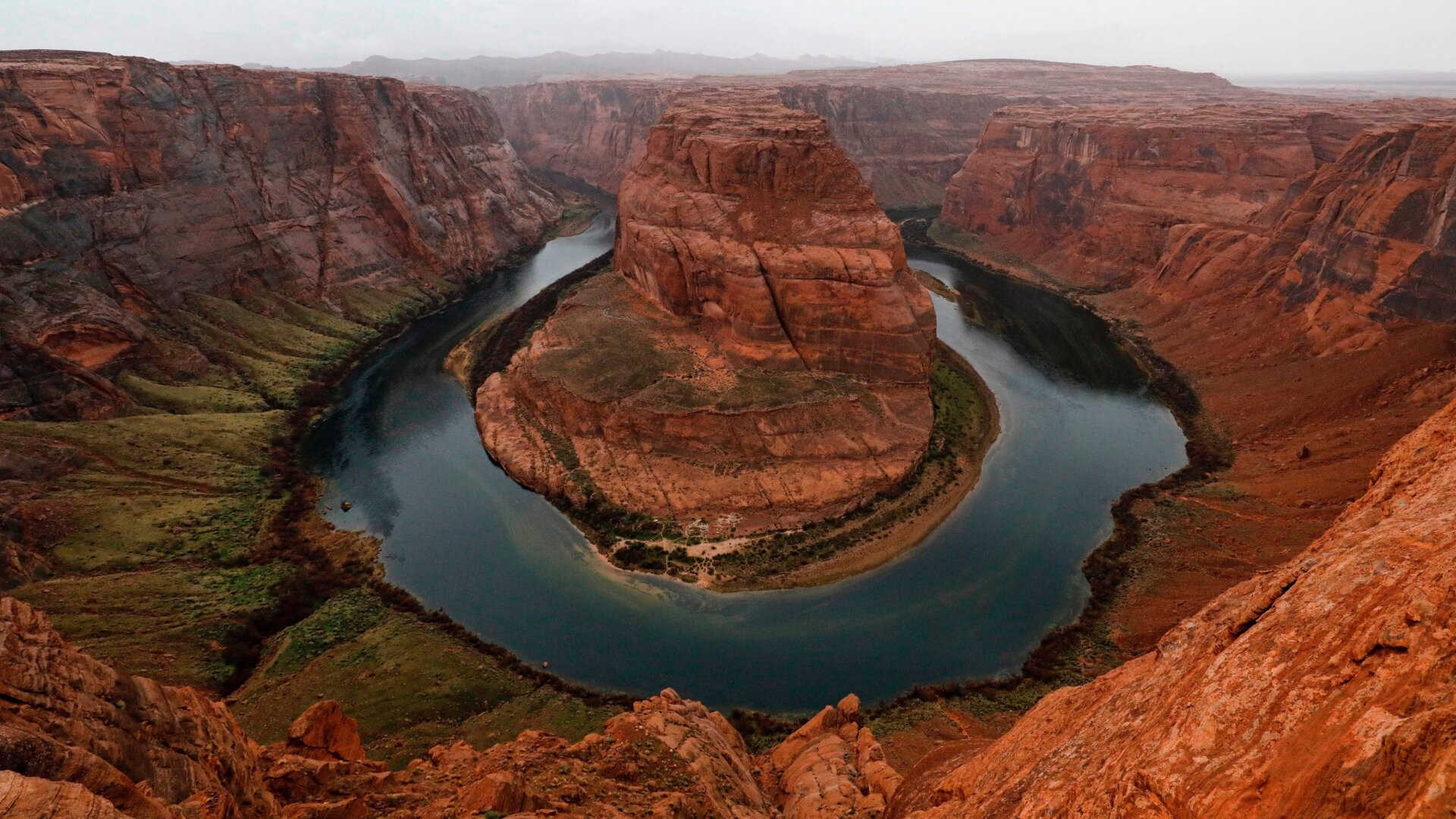 The Colorado River wraps around Horseshoe Bend in the in Glen Canyon National Recreation Area in Page, Arizona.