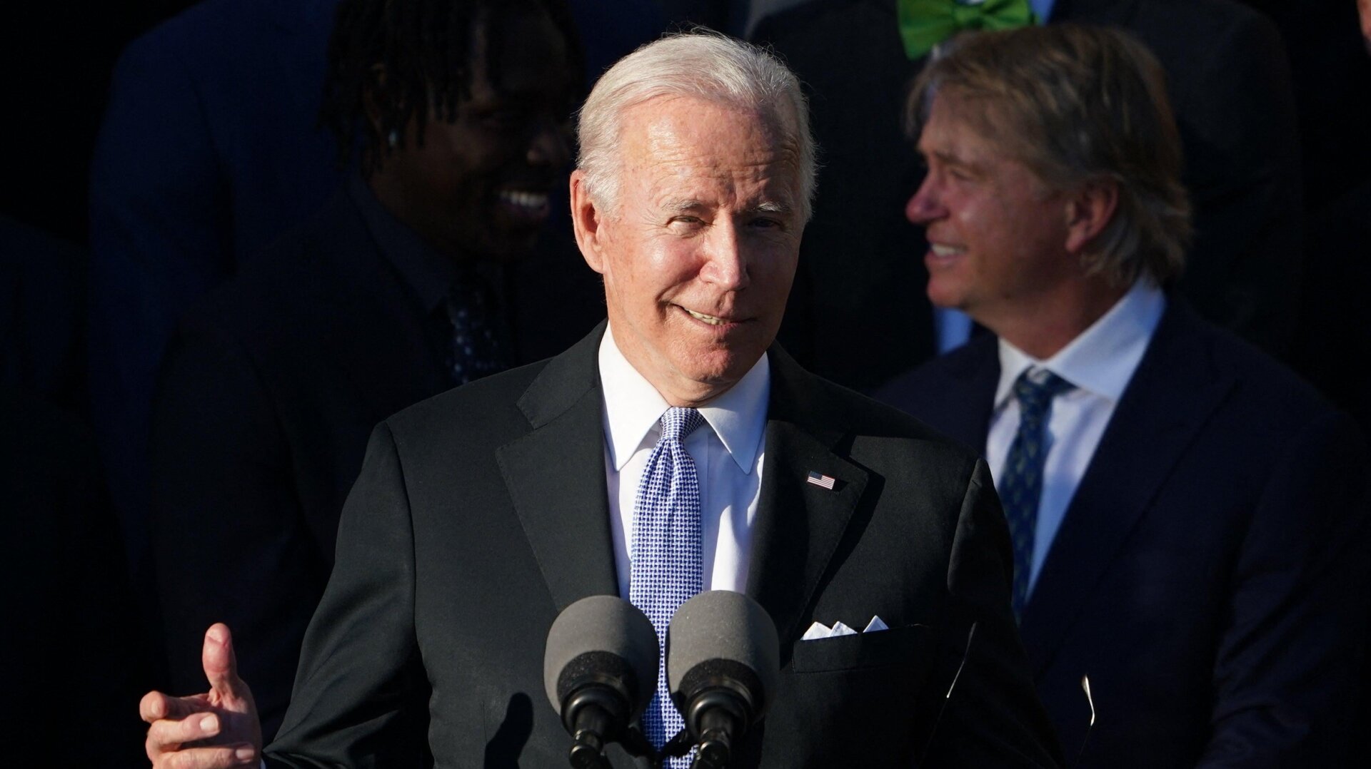 US President Joe Biden speaks on the South Lawn of the White House in Washington, DC on November 8, 2021.