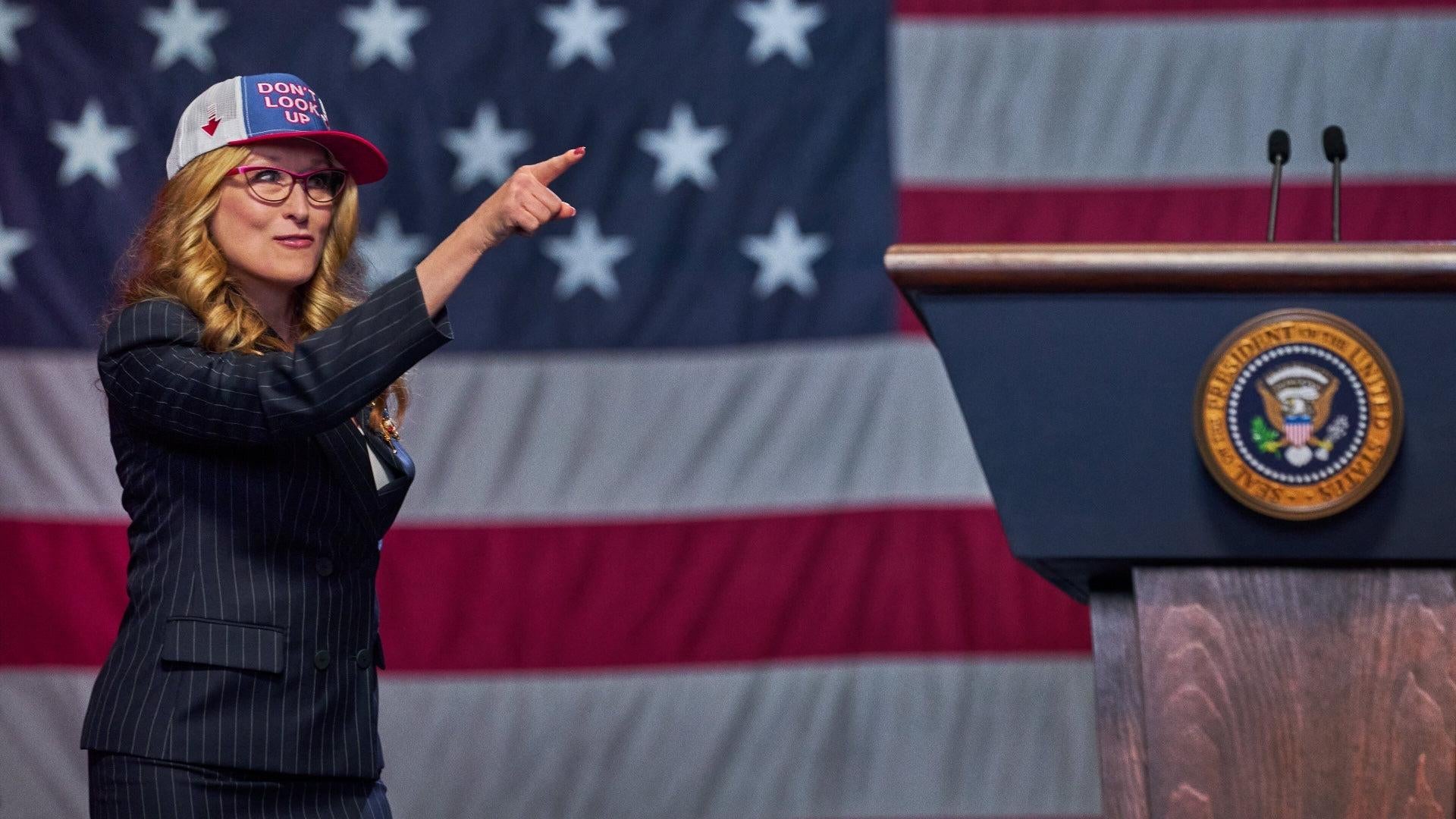 Meryl Streep is a president with a slogan cap.