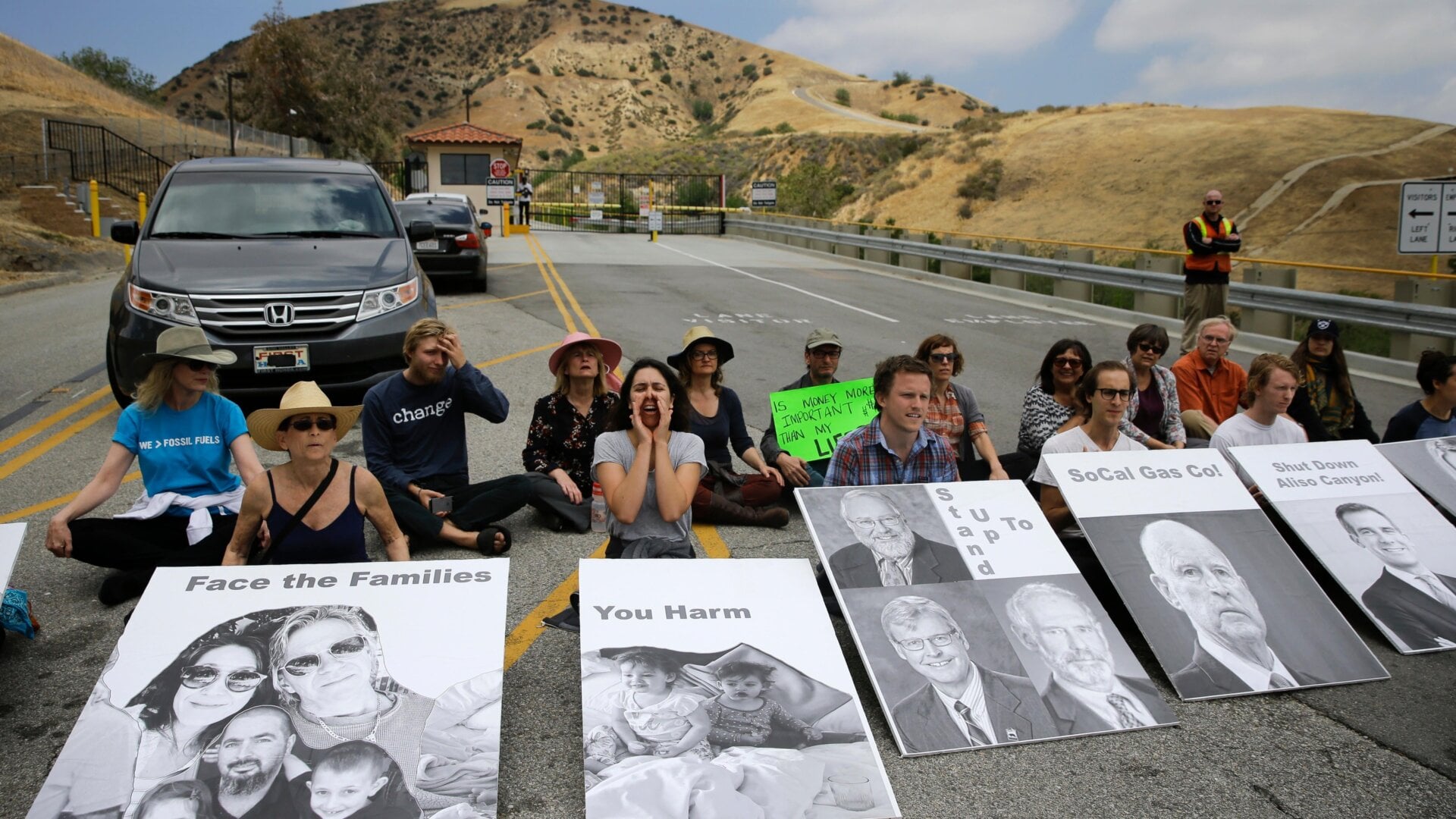 People chant slogans during a protest outside the Aliso Canyon storage facility, in the Porter Ranch section of Los Angeles, May 2016.