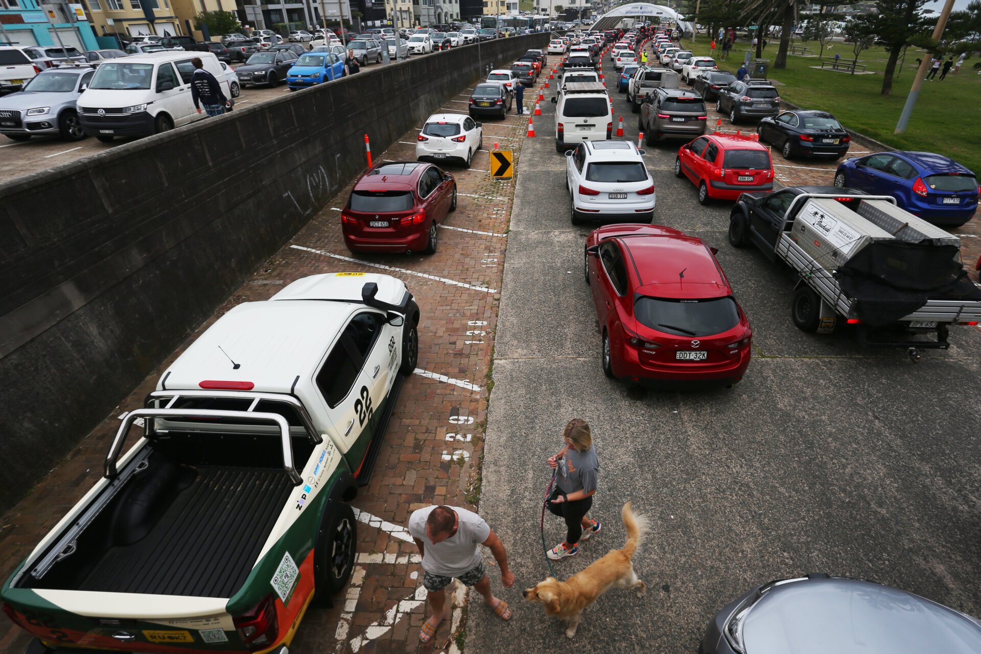 People queue at the St Vincent’s Bondi Beach covid-19 drive-through testing clinic on December 17, 2021 in Sydney, Australia. 