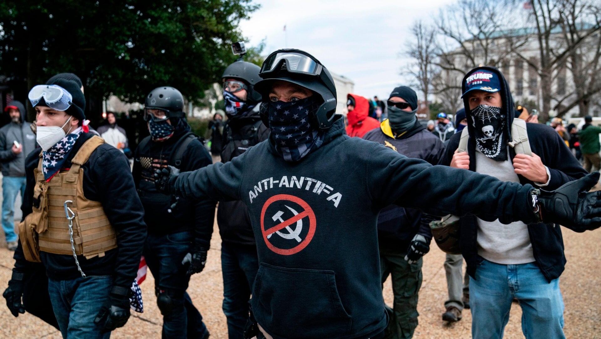 A protester who declared himself to be a member of the Proud Boys, center, seen here amid other Donald Trump supporters outside the Capitol on Jan. 6.