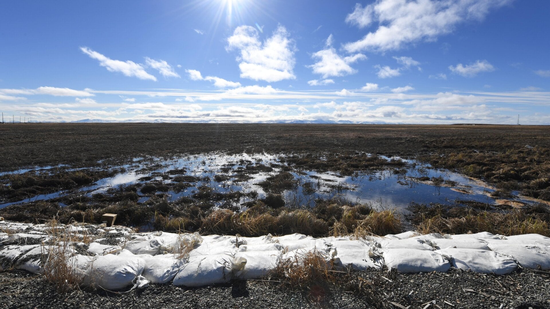 Melting permafrost tundra at the town of Quinhagak on the Yukon Delta in Alaska on April 12, 2019.