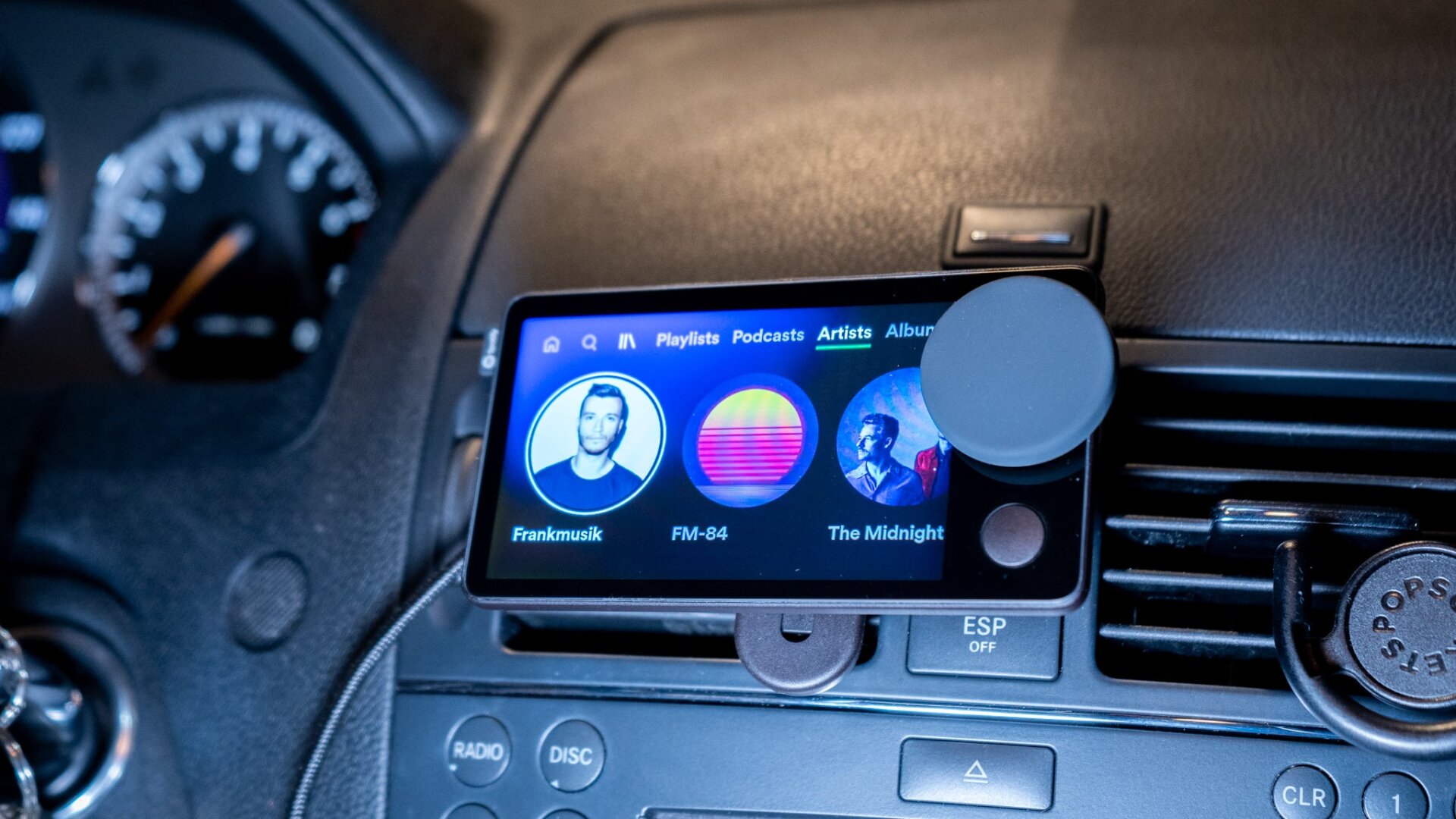 Car Thing can take you through your latest playlists, artists, and even your favorite podcasts.