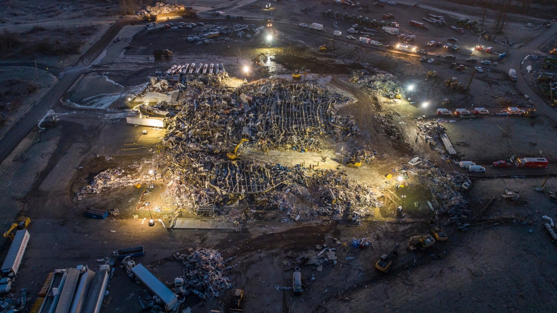 Search are rescue crews work at the Mayfield Consumer Products candle factory early Sunday, Dec. 12, 2021 in Mayfield, Kentucky.