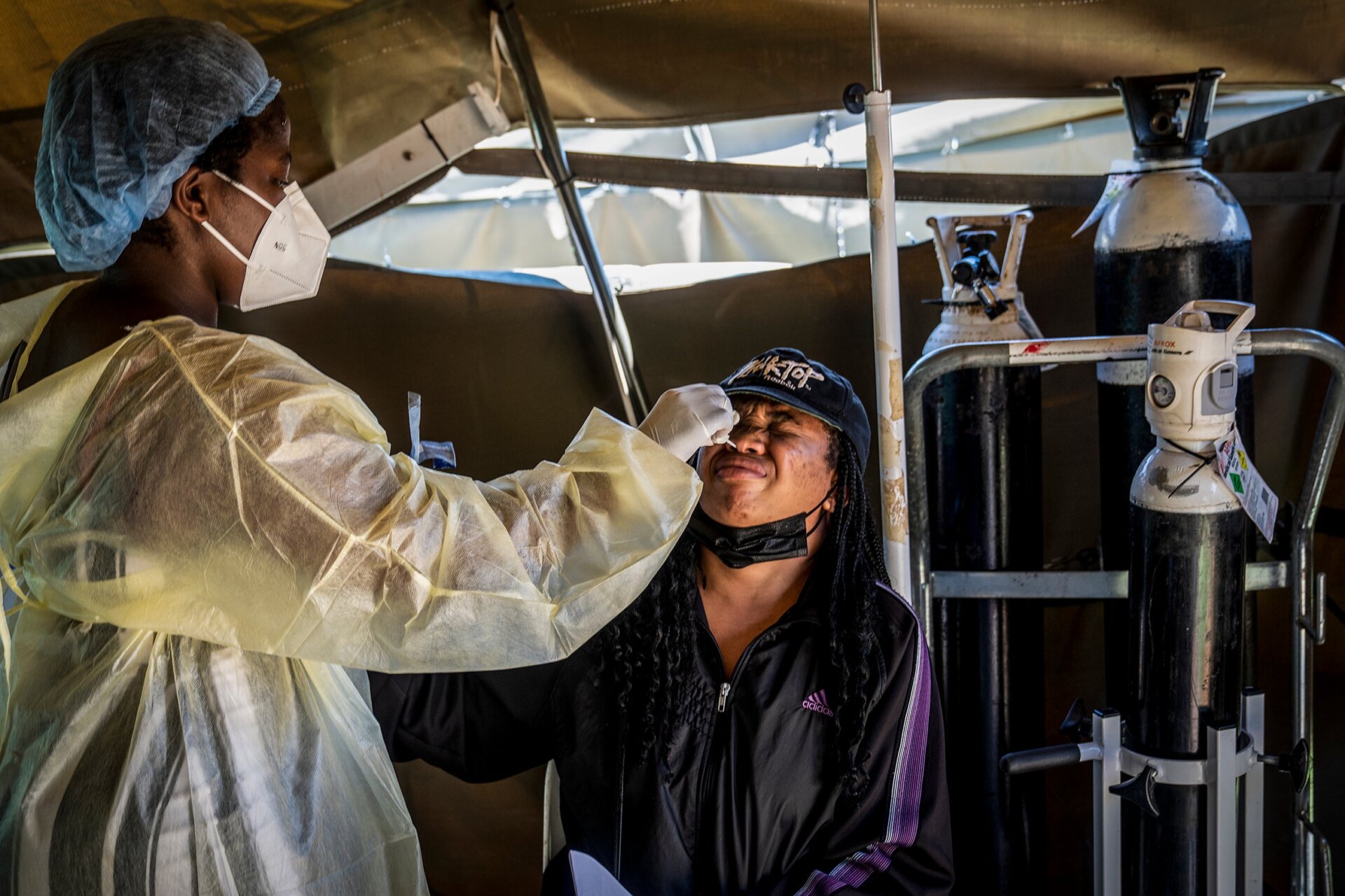 A woman is tested for covid-19 at the Lenasia South Hospital, near Johannesburg, South Africa, on Wednesday, Dec. 1, 1021. 