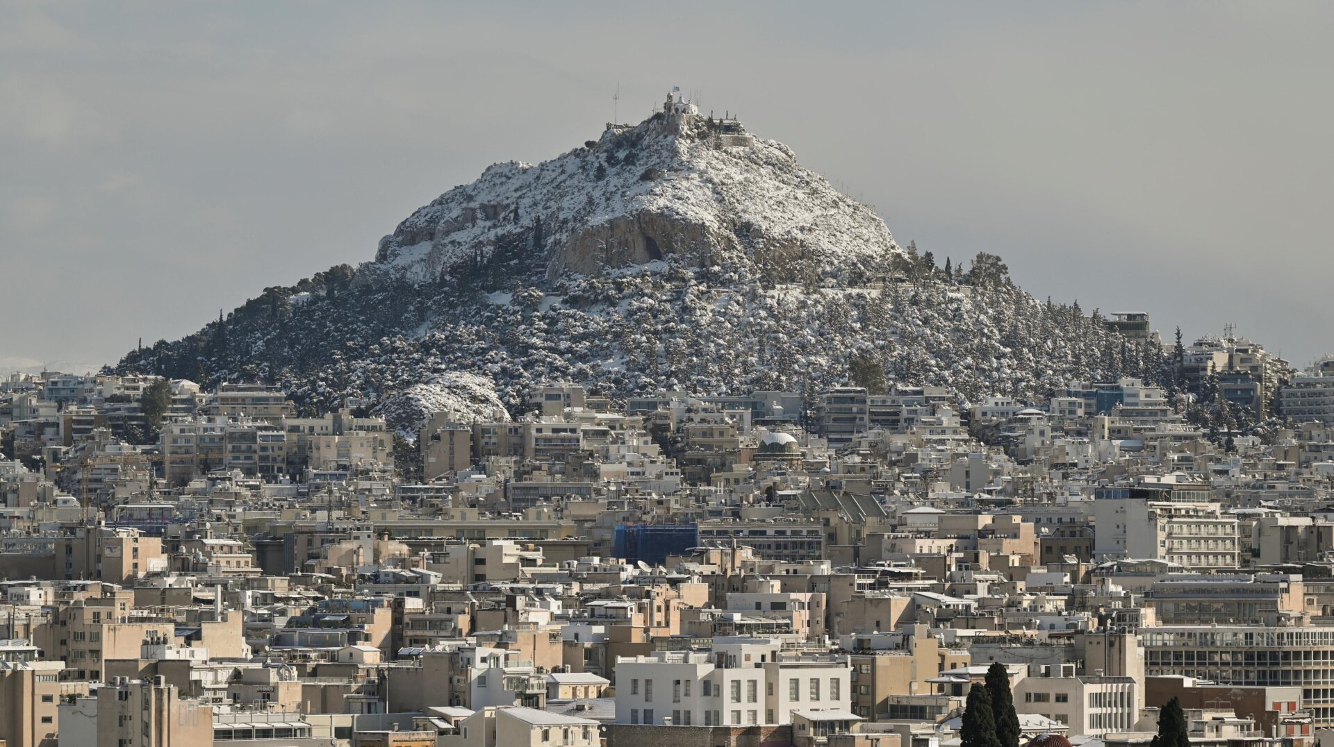Snow-covered Lycabettus Hill in Athens.