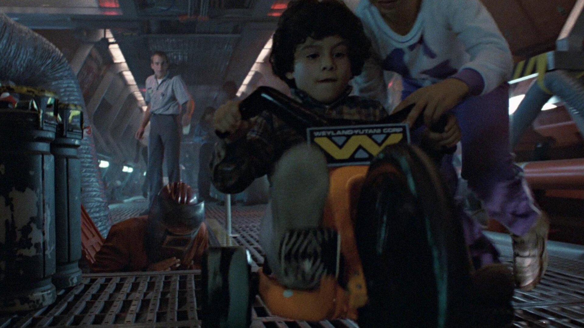 A kid rides a Weyland-Yutani-branded Big Wheel in this deleted scene from Aliens.