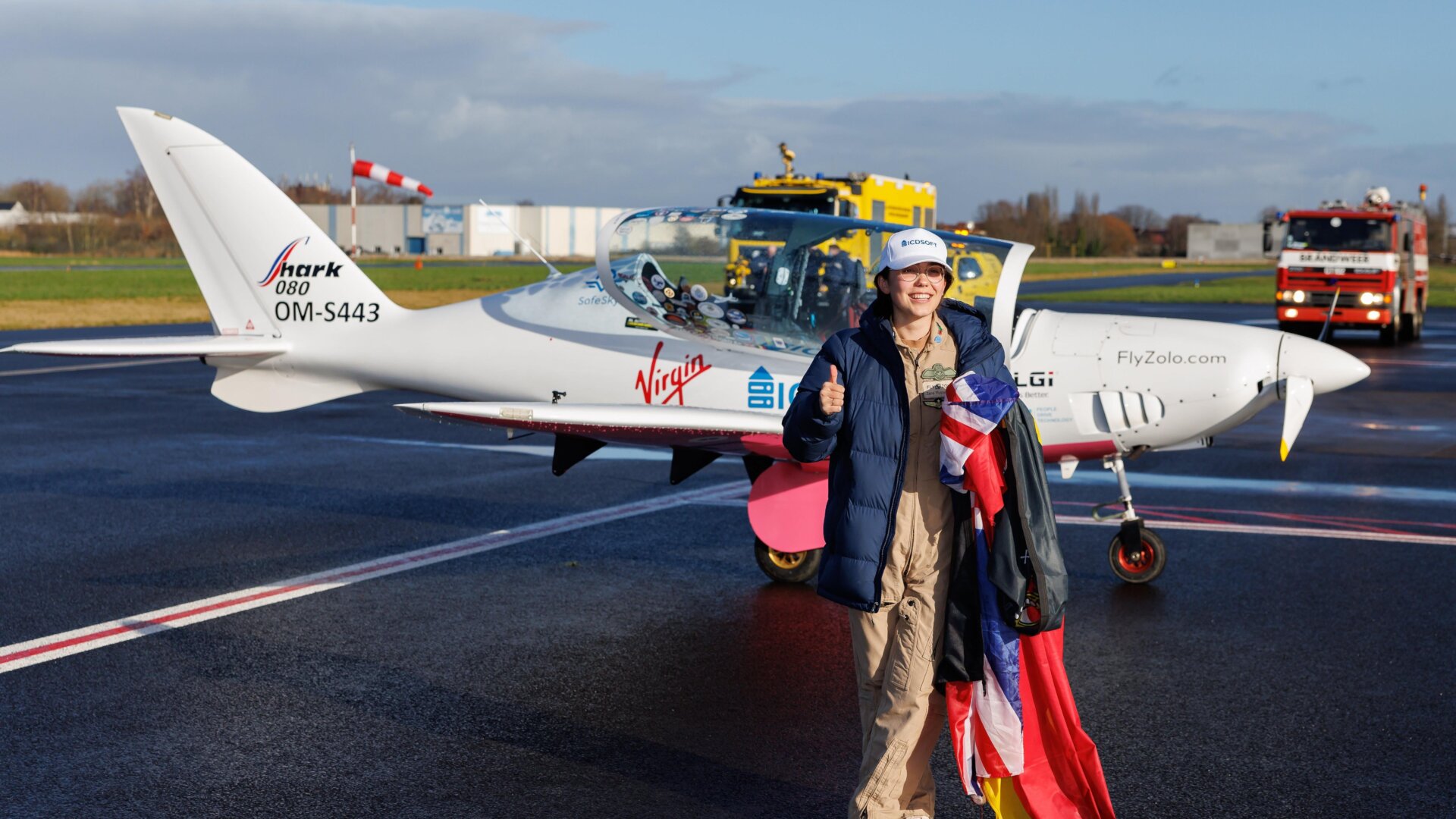 Zara Rutherford exits her plane upon the completion of her five-month solo trip around the world.