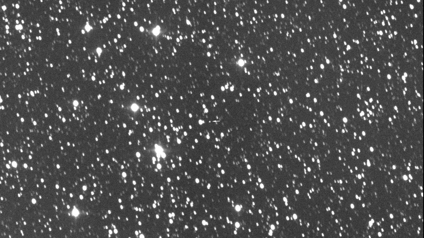 The tiny arrow (center of image) points to the Webb Space Telescope, which arrived at L2 on January 24, 2022.