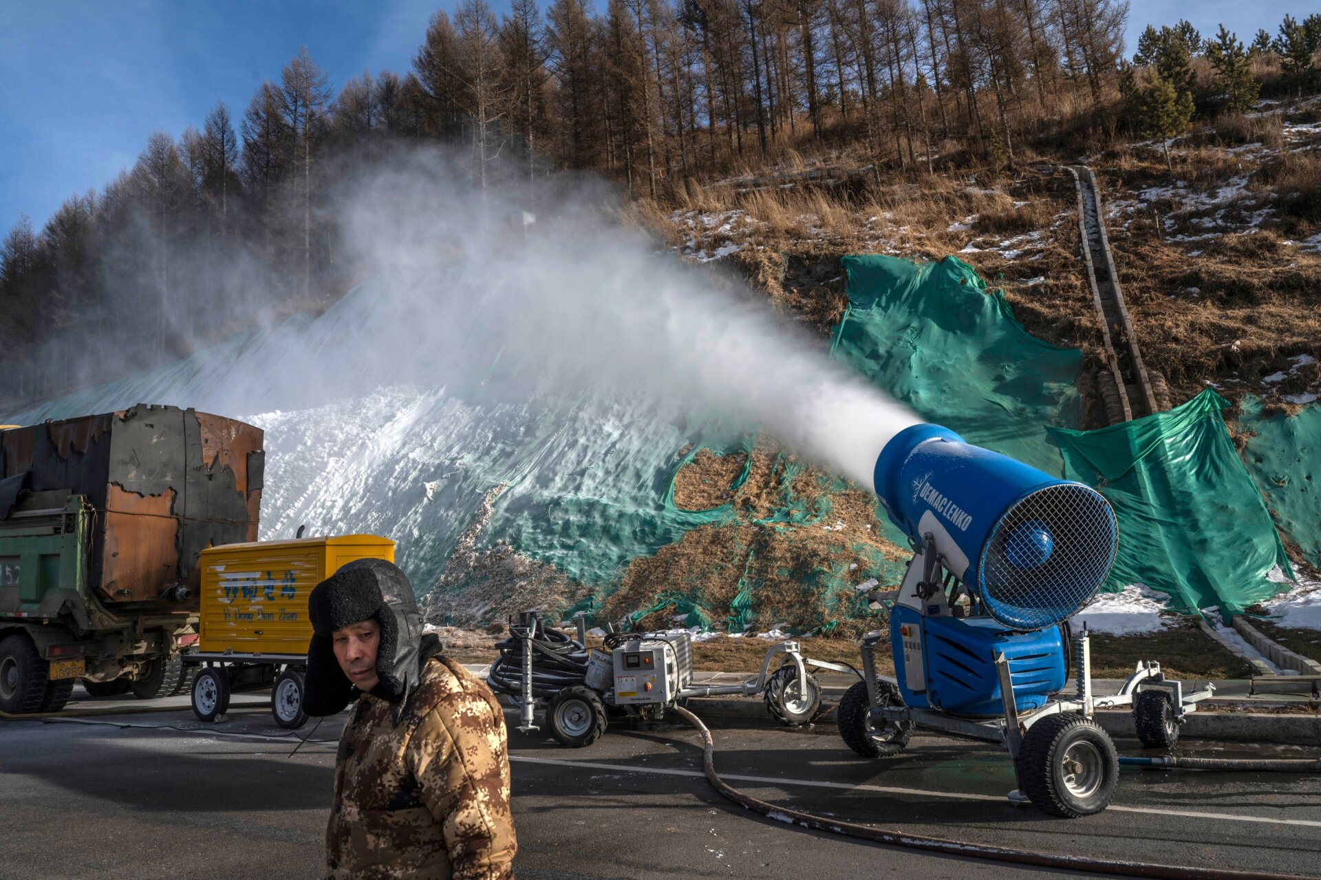 A snow machine makes artificial snow for the Beijing 2022 Winter Olympics on January 2, 2022 in Zhangjiakou, Hebei province, northern China. 
