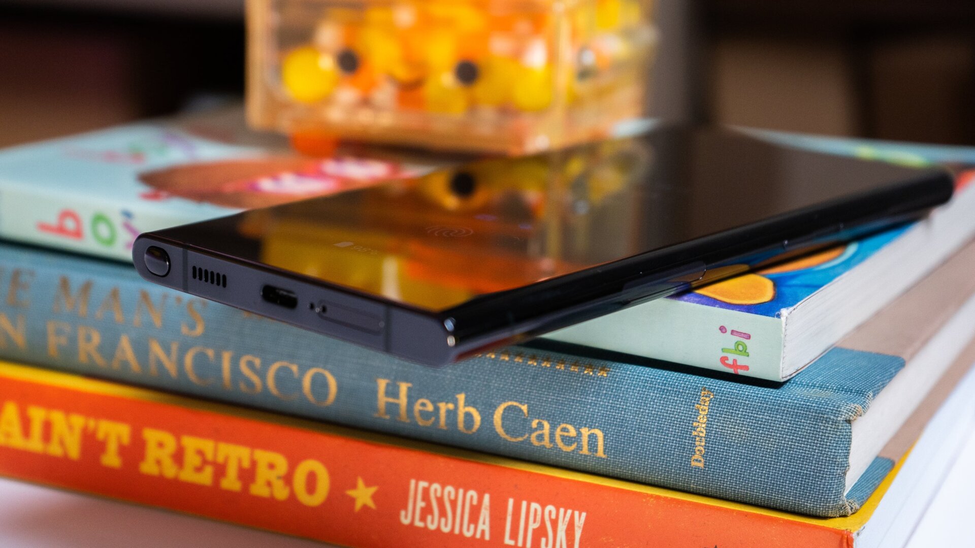 The bottom of the Galaxy S22 Ultra has no headphone jack, but it does house a USB-C port next to the pop-out S Pen.