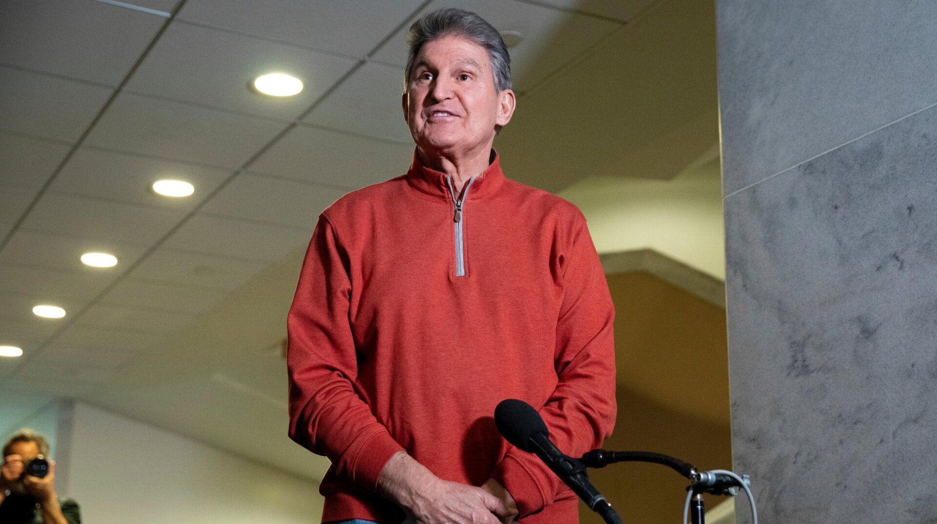 Sen. Joe Manchin, D-W.Va., responds to questions from reporters before a meeting with his fellow Democrats at the Capitol in Washington, Tuesday, Jan. 18, 2022.