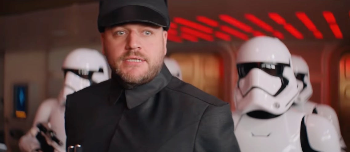 This guy wants a piece of your vacation, or else.