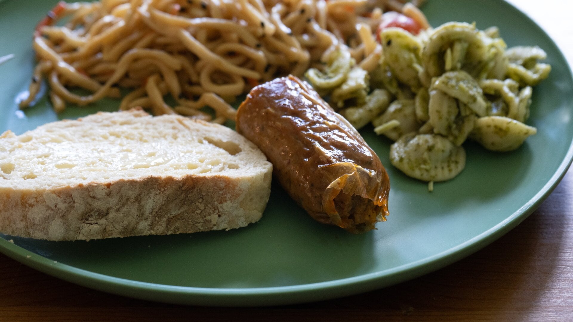 The Impossible Foods sausage link has an outer casing like a meat-based sausage.