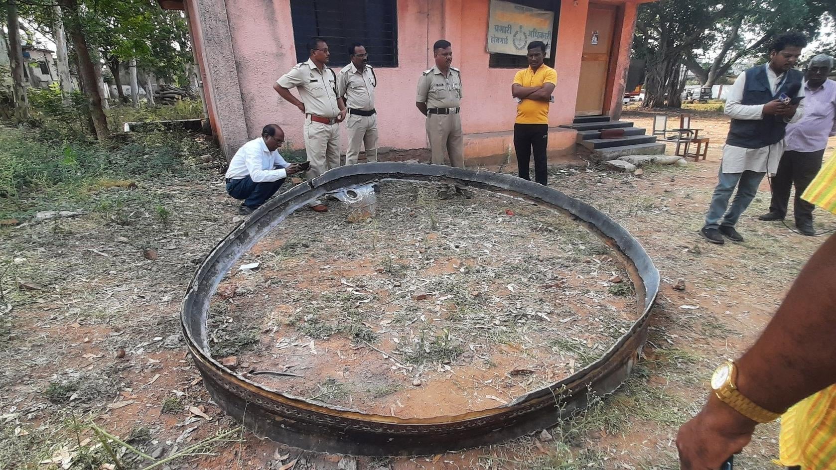 A view of the 9-foot-wide metal ring that fell onto western rural India.