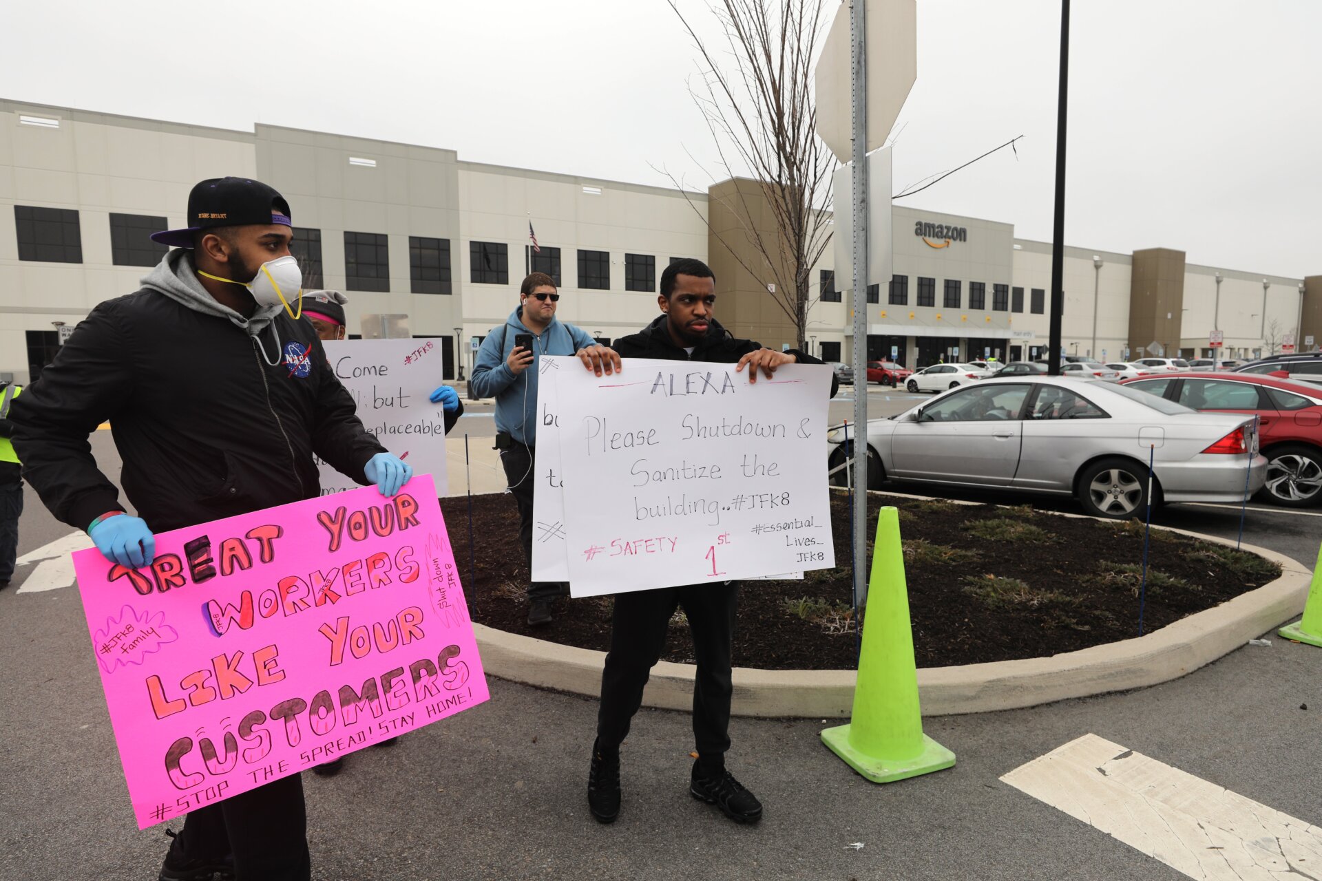 Protesters stand outside the Staten Island Amazon warehouse in March, 2020 protesting against what they said was lax sanitation during the height of Covid-19.