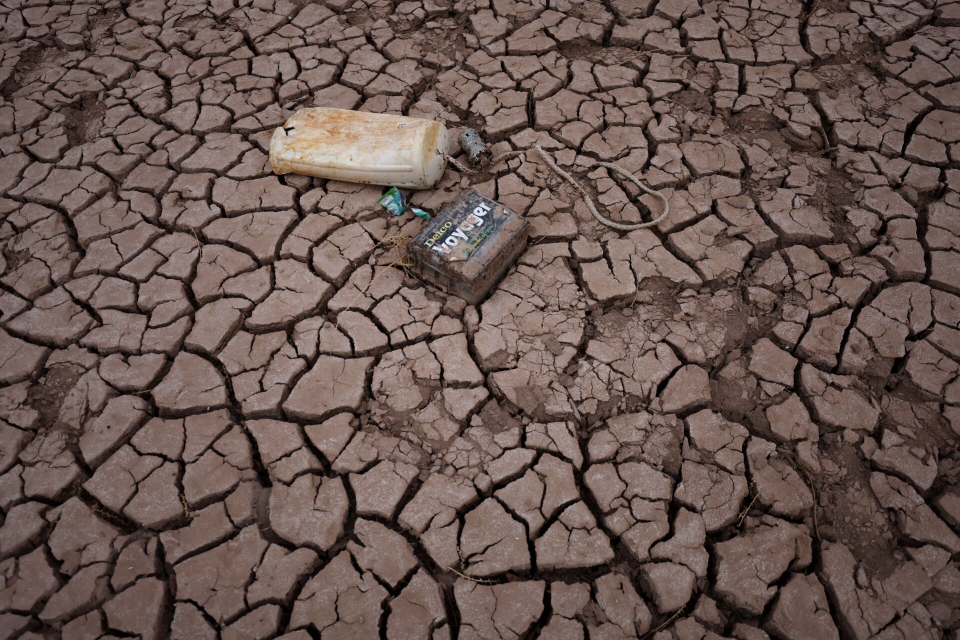  Dry cracked earth is visible in an area of Lake Powell that was previously underwater.
