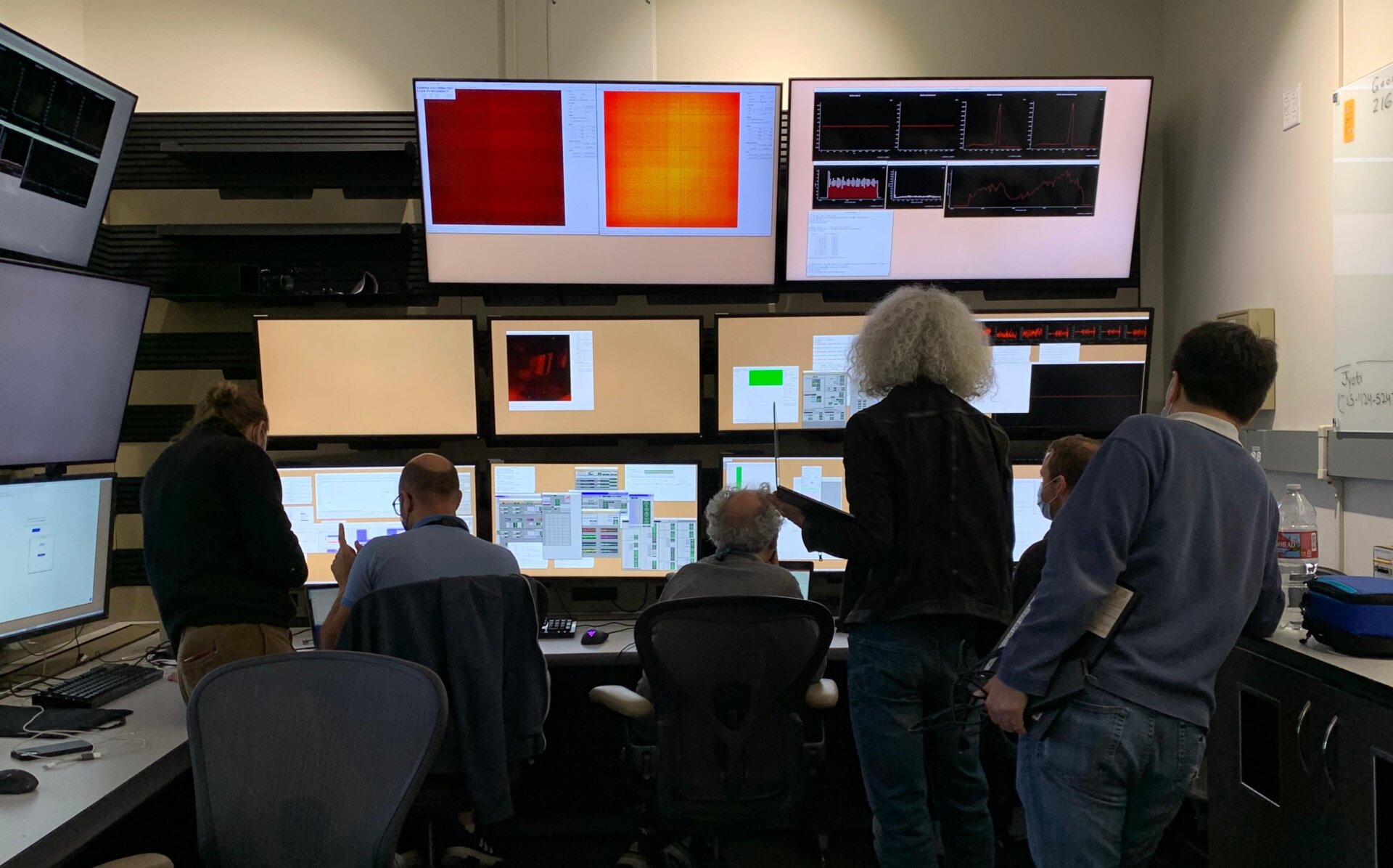 Researchers checkout results from the chemRIXS instrument tests.