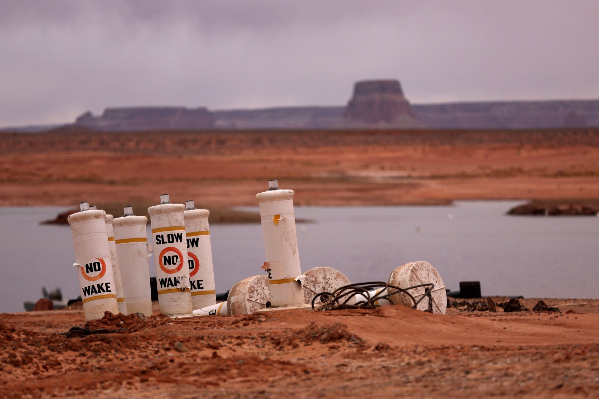 Buoys sit on the beach near the Wahweap Marina at Lake Powell.