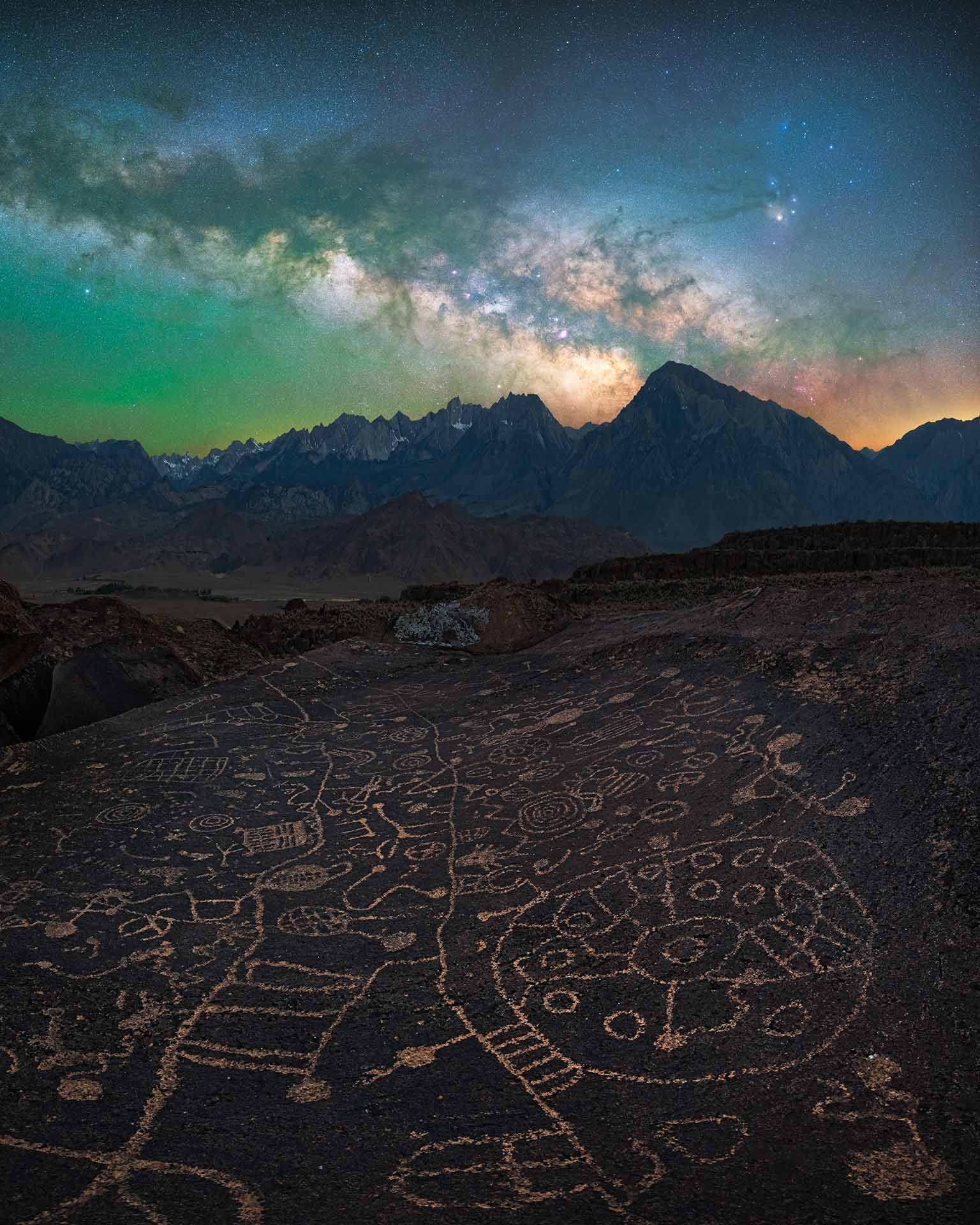 Native American petroglyphs under the Milky Way.