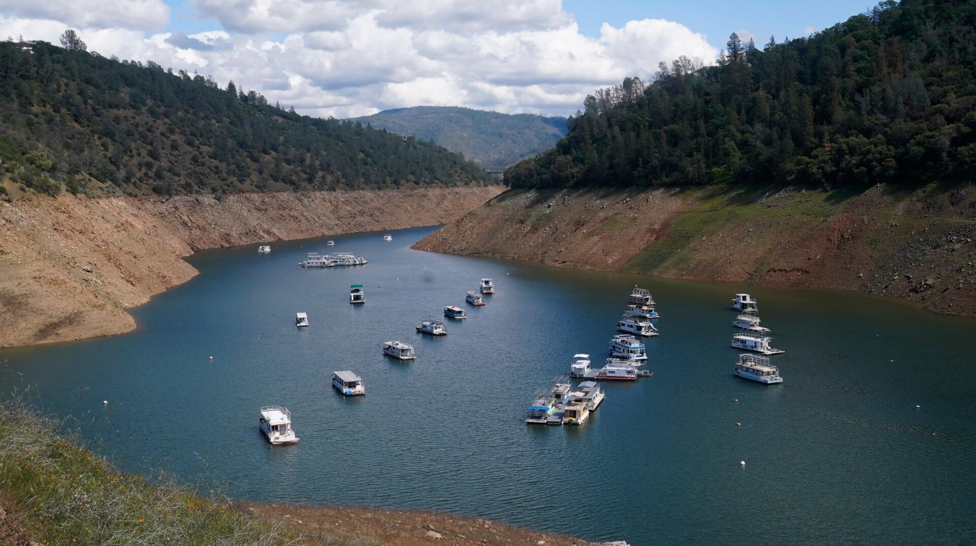 Houseboats sit in the drought-lowered waters of Lake Oroville, near Oroville, California.
