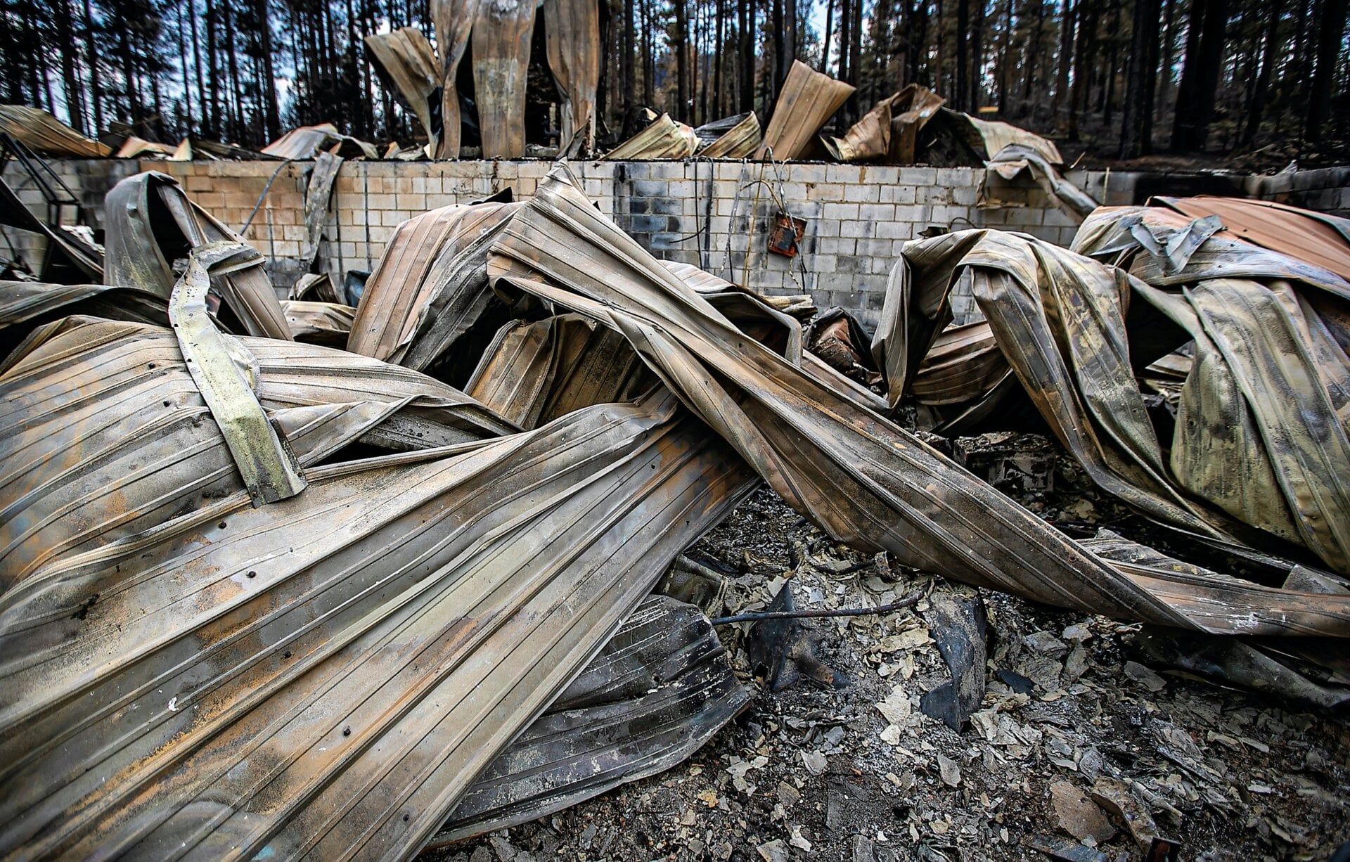 The remains of a structure near Mora, New Mexico May 4 due to the ongoing Hermit’s Peak/Calf Canyon wildfire.