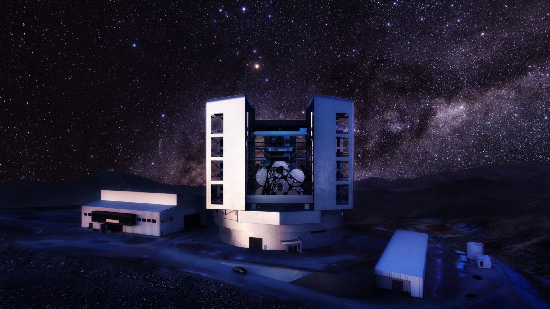 A rendering of the Giant Magellan Telescope in the Atacama Desert at night.