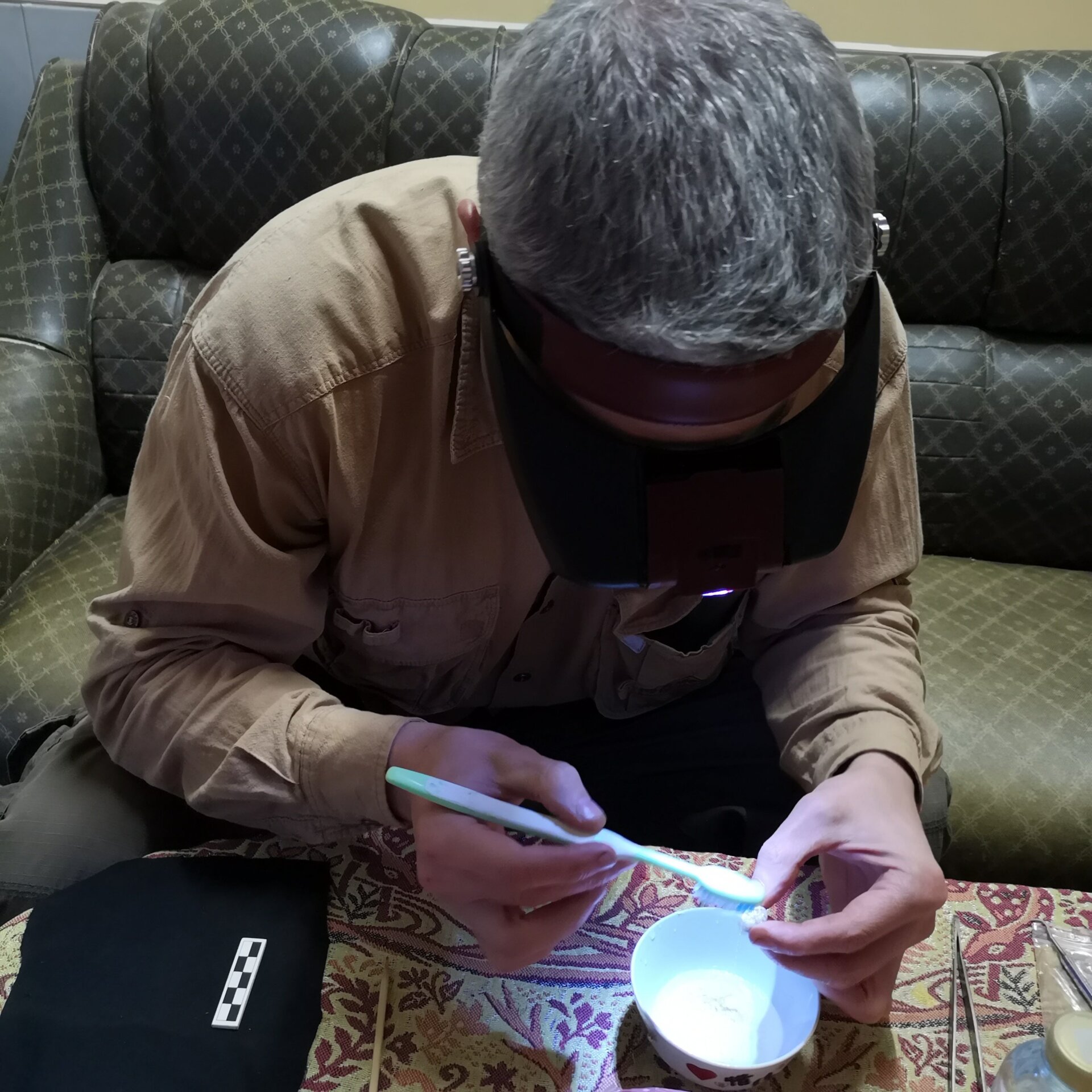 Study co-author Fabrice Demeter analyzing the molar.