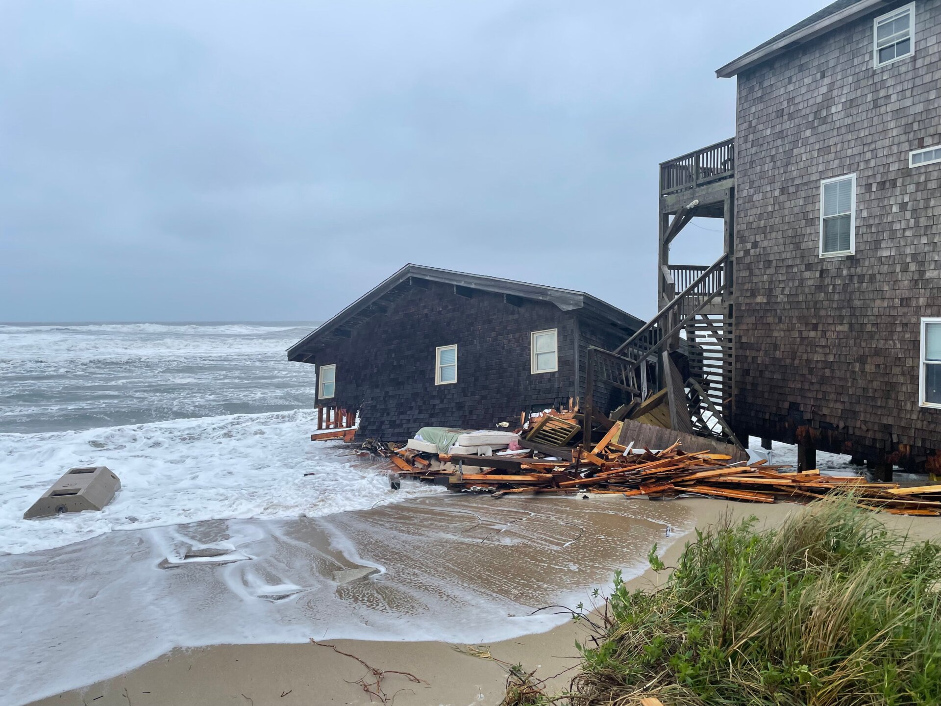 This unoccupied house collapsed sometime in the morning on May 10, falling into the rising tide.
