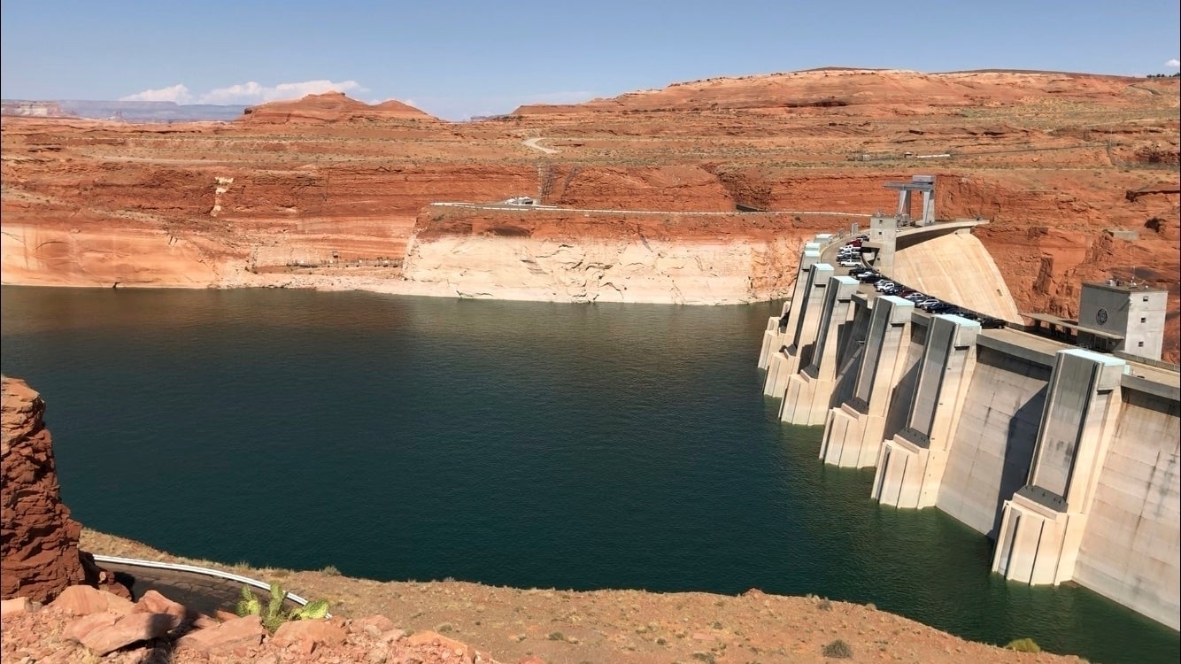 Lake Powell and Glen Canyon Dam in August 2019. The water level is even lower now. The newest federal efforts to keep the dam’s hydropower pumping are only projected to be enough for the next 12 months.