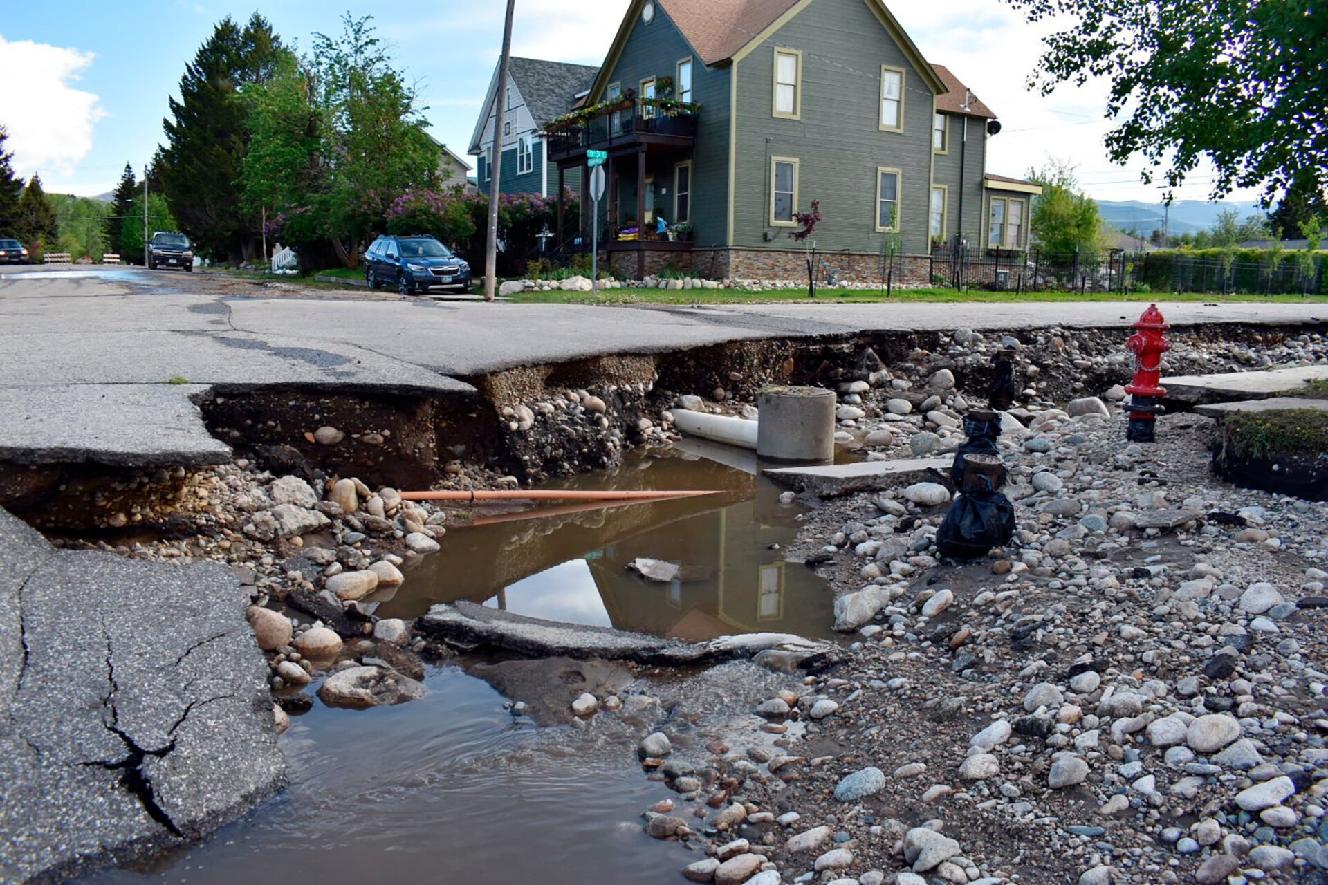 Where the floodwaters have receded, the damage is extensive. The drinking water and sewage infrastructure, as well as the electric grid are likely to need lots of repairs. In Red Lodge, streets crumbled away and plumbing lines were visible.