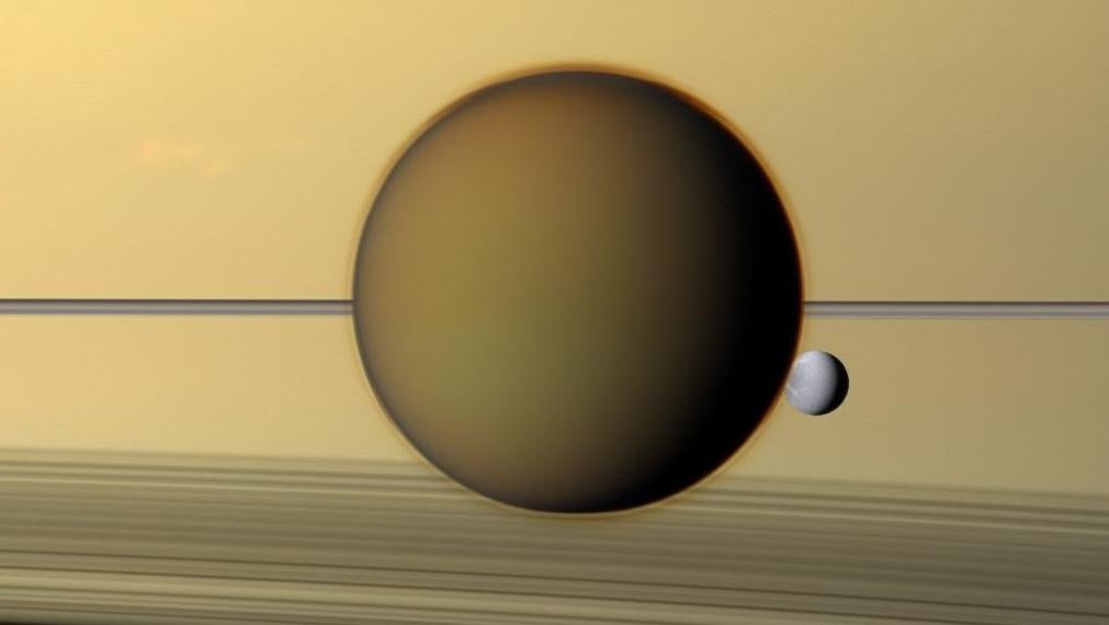 Titan (and Dione, a smaller Saturnian moon) as seen by the Cassini spacecraft.