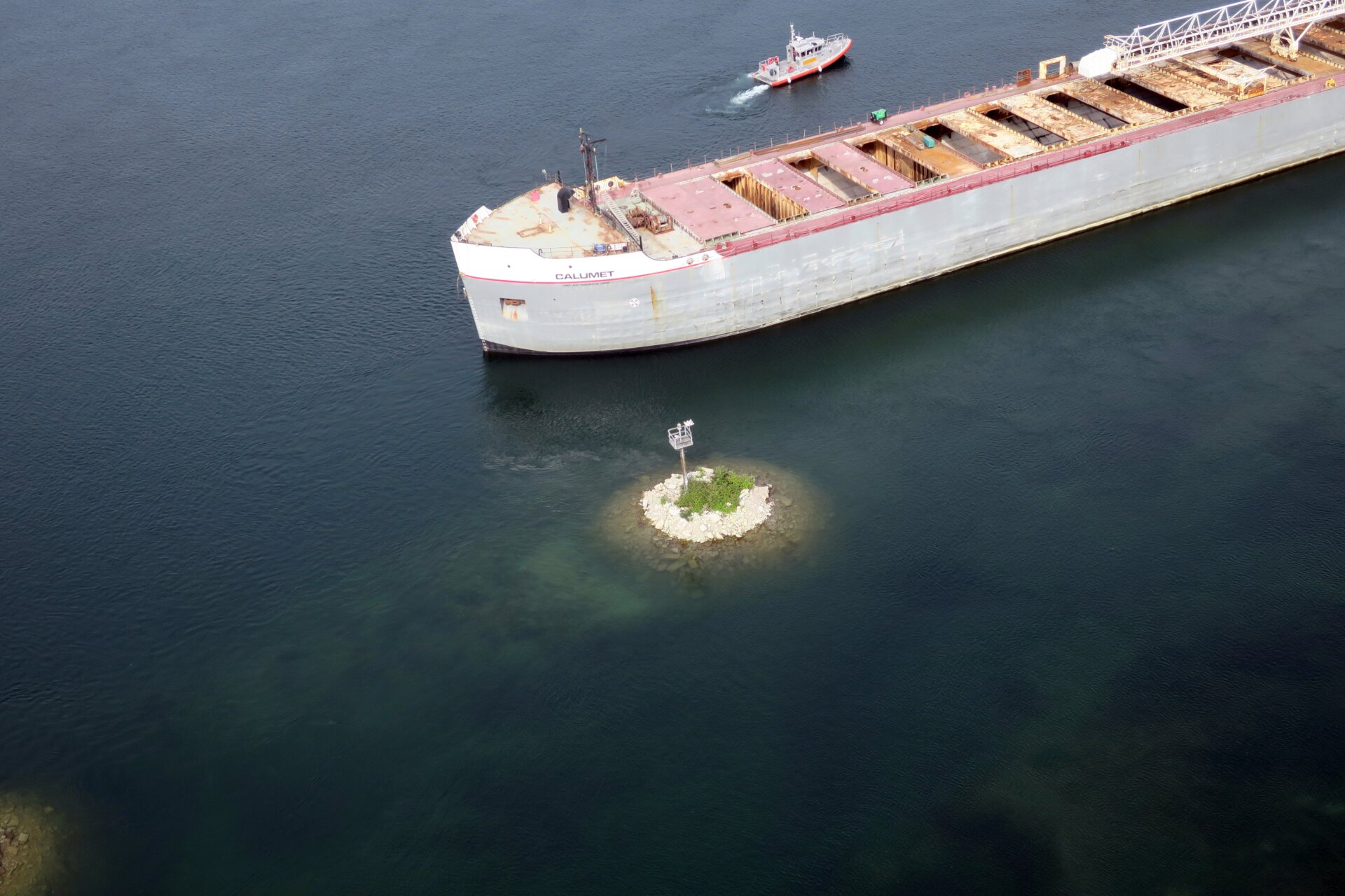 Freighters and other commercial ships routinely traverse the St. Mary’s River. The one pictured above ran aground in 2017.
