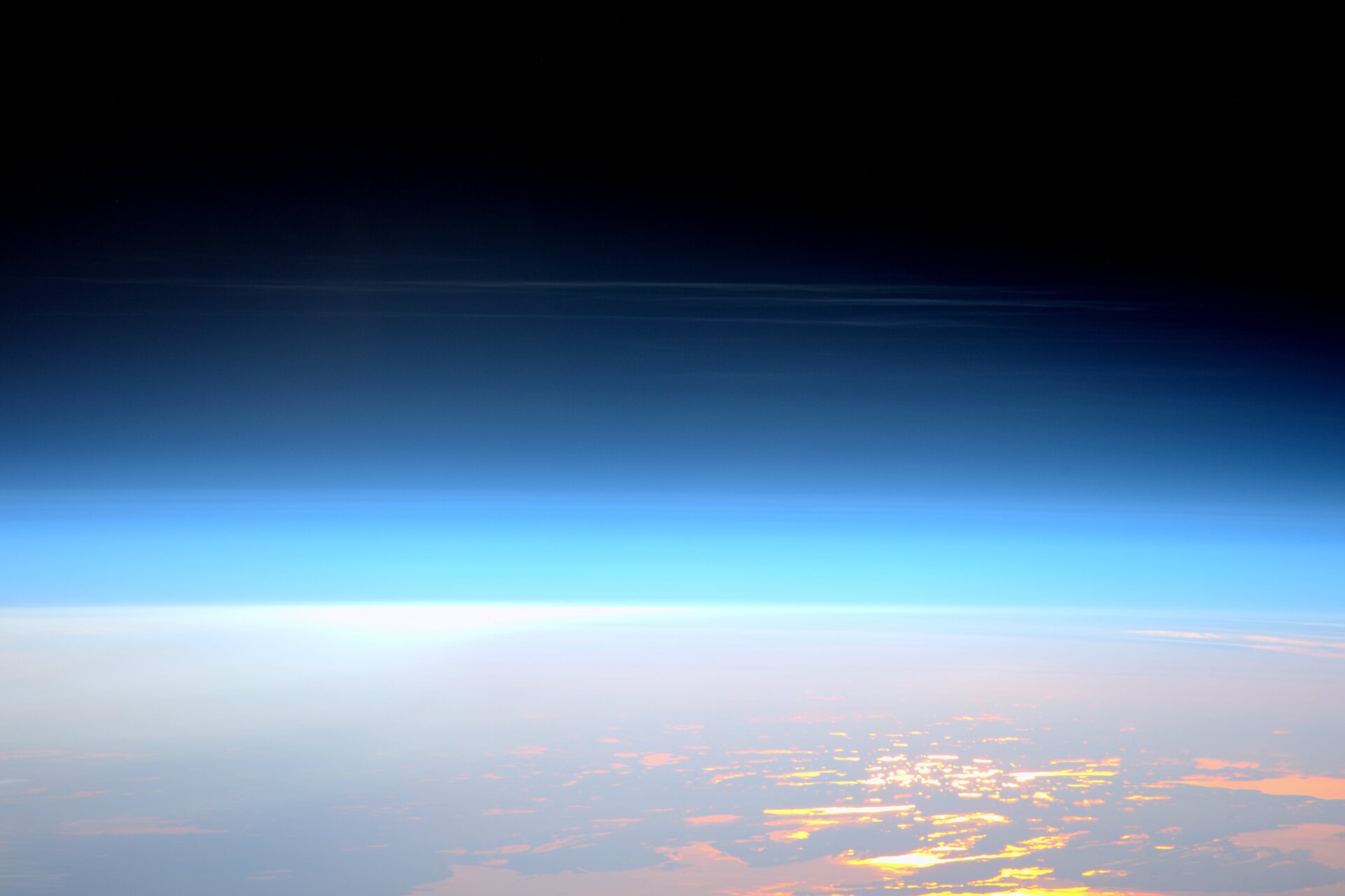 A view of noctilucent clouds forming in the mesosphere from the International Space Station in May 2016.