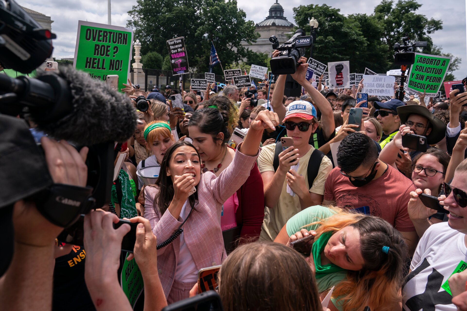 Rep. Alexandria Ocasio-Cortez (D-NY) speaks to abortion-rights activists  in front of the U.S. Supreme Court after the Court announced a ruling  in the Dobbs v Jackson Women’s Health Organization case on June 24, 2022  in Washington, DC.