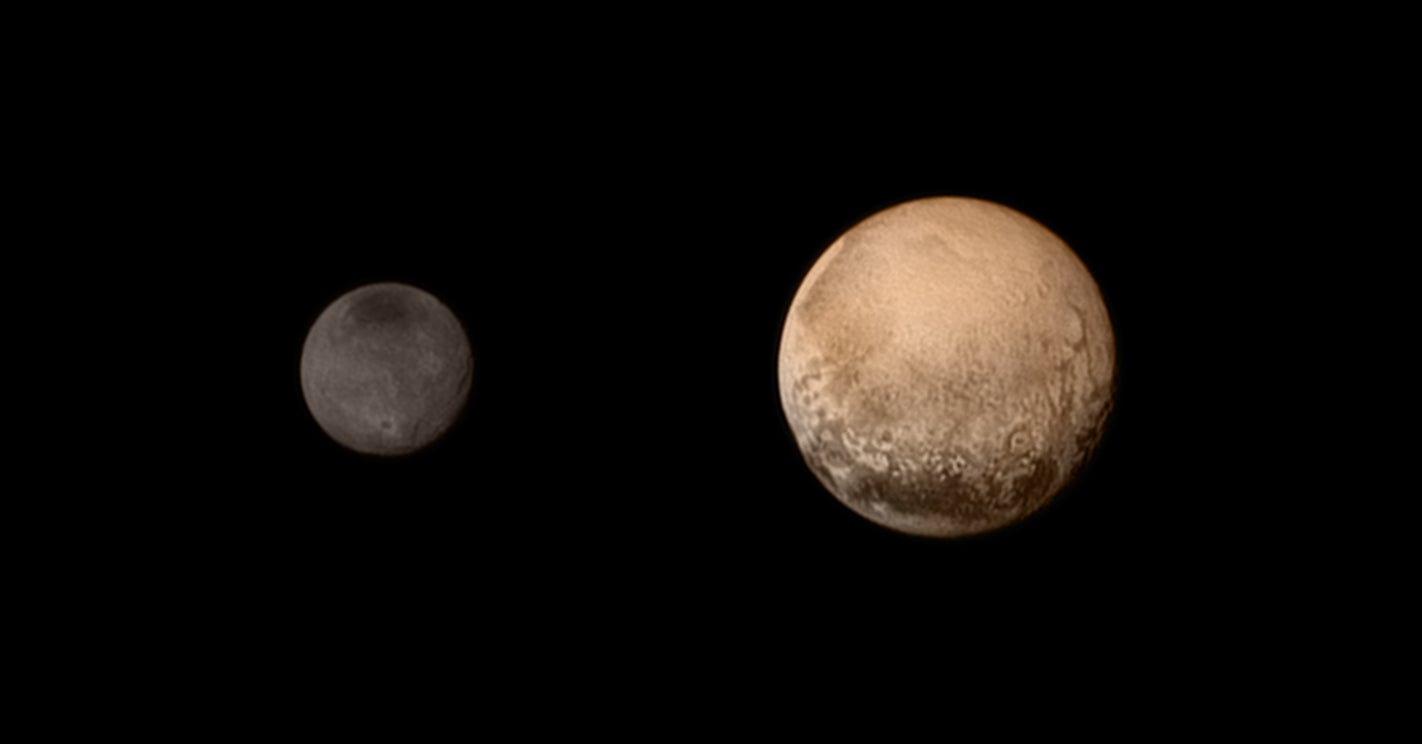 Pluto (right) and Charon (left) in an image taken by the New Horizons spacecraft.